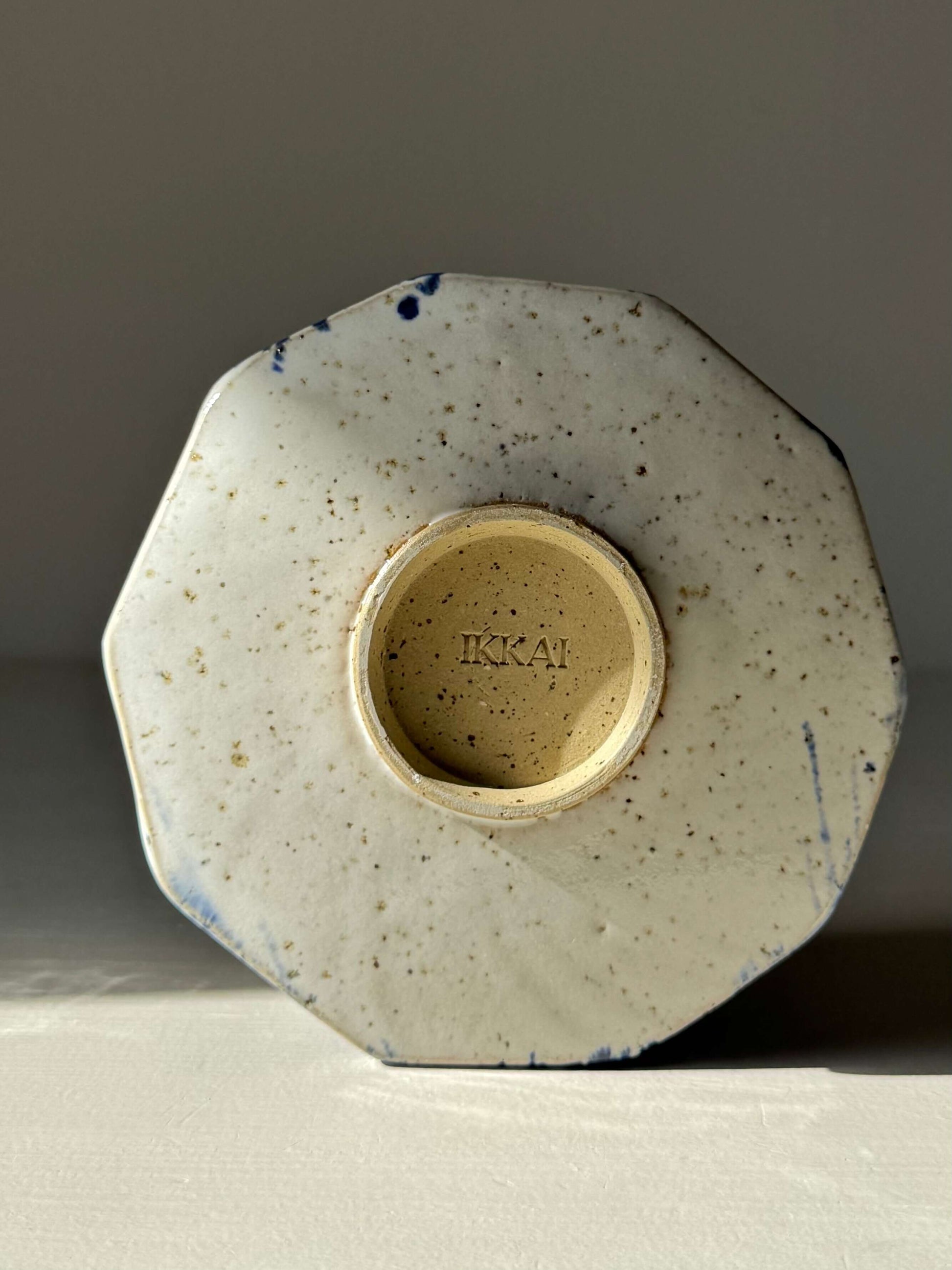 Bottom view of Faceted Matcha Bowl with Spout – Cobalt Blue & Glossy White Glaze #09, showing the handmade ceramic design.