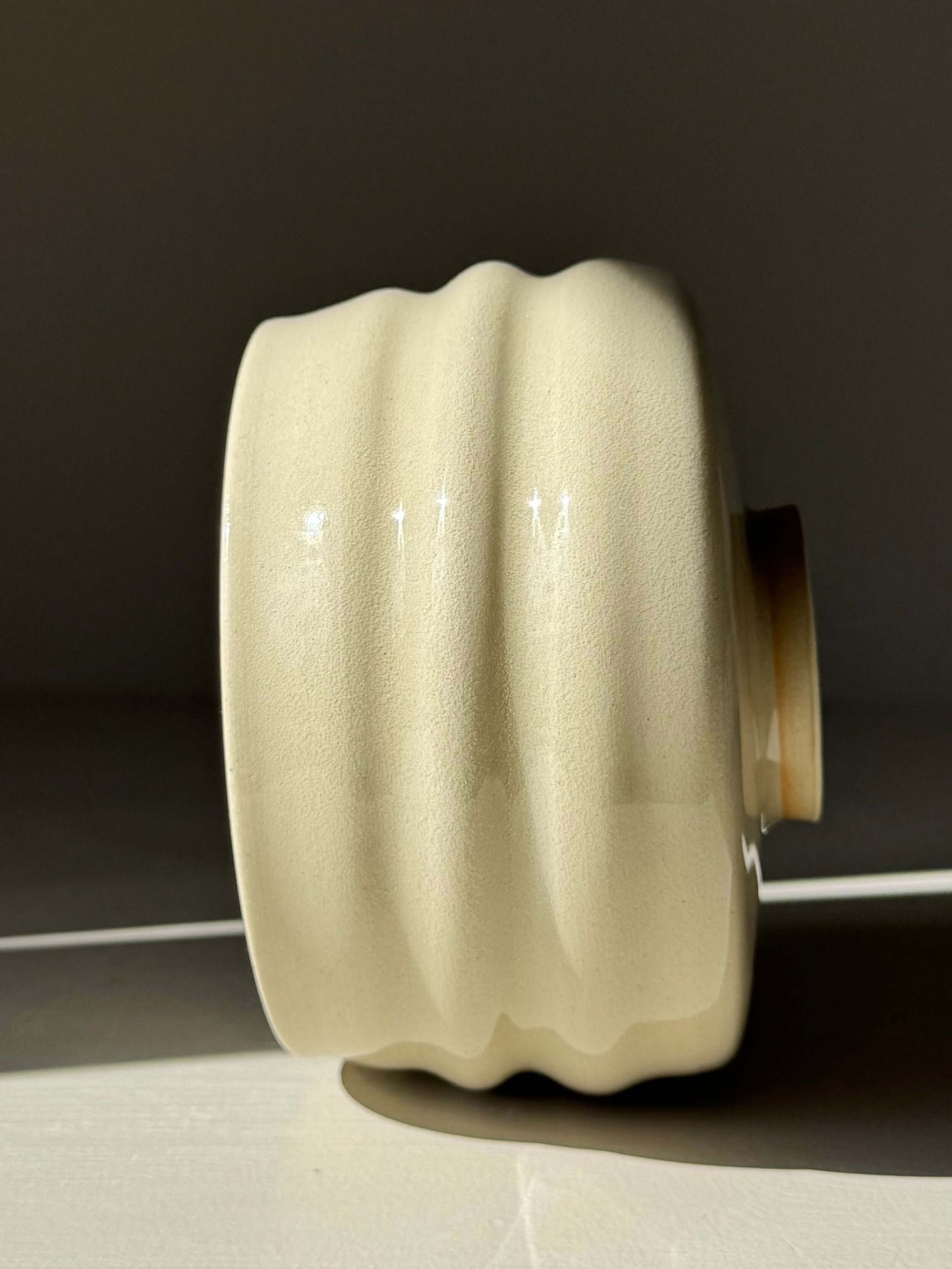Matcha Bowl - Clear Glaze #02 handmade ceramic with carved ridges, showing natural clay warmth and glowing curves.
