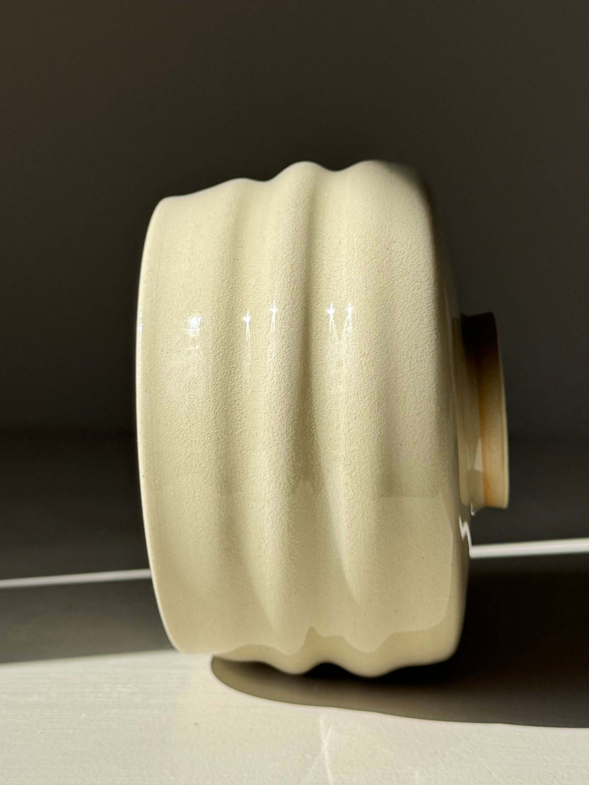 Matcha Bowl - Clear Glaze #02 handmade ceramic with carved ridges, showing natural clay warmth and glowing curves.