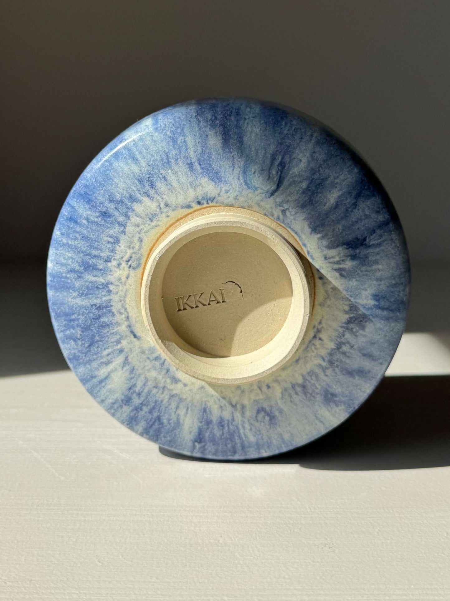 Bottom view of Matcha bowl - Cobalt Blue & Moonstone Glaze #06 with handmade ceramic finish showing small crack, perfect for tea moments.