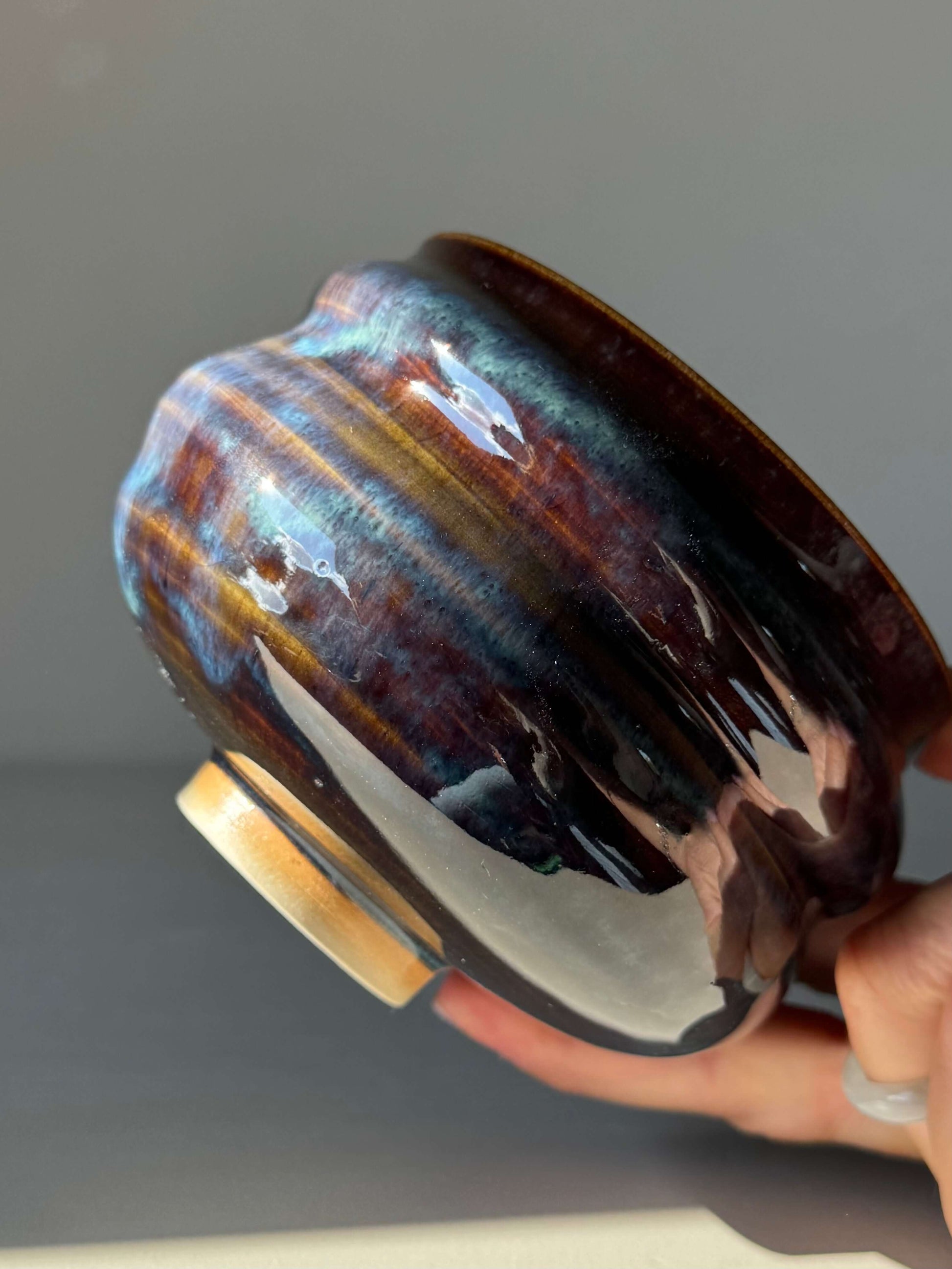 Matcha Bowl - Glossy Blue #04 handmade ceramic with flowing blue and earthy tones, unique texture and raised foot design.