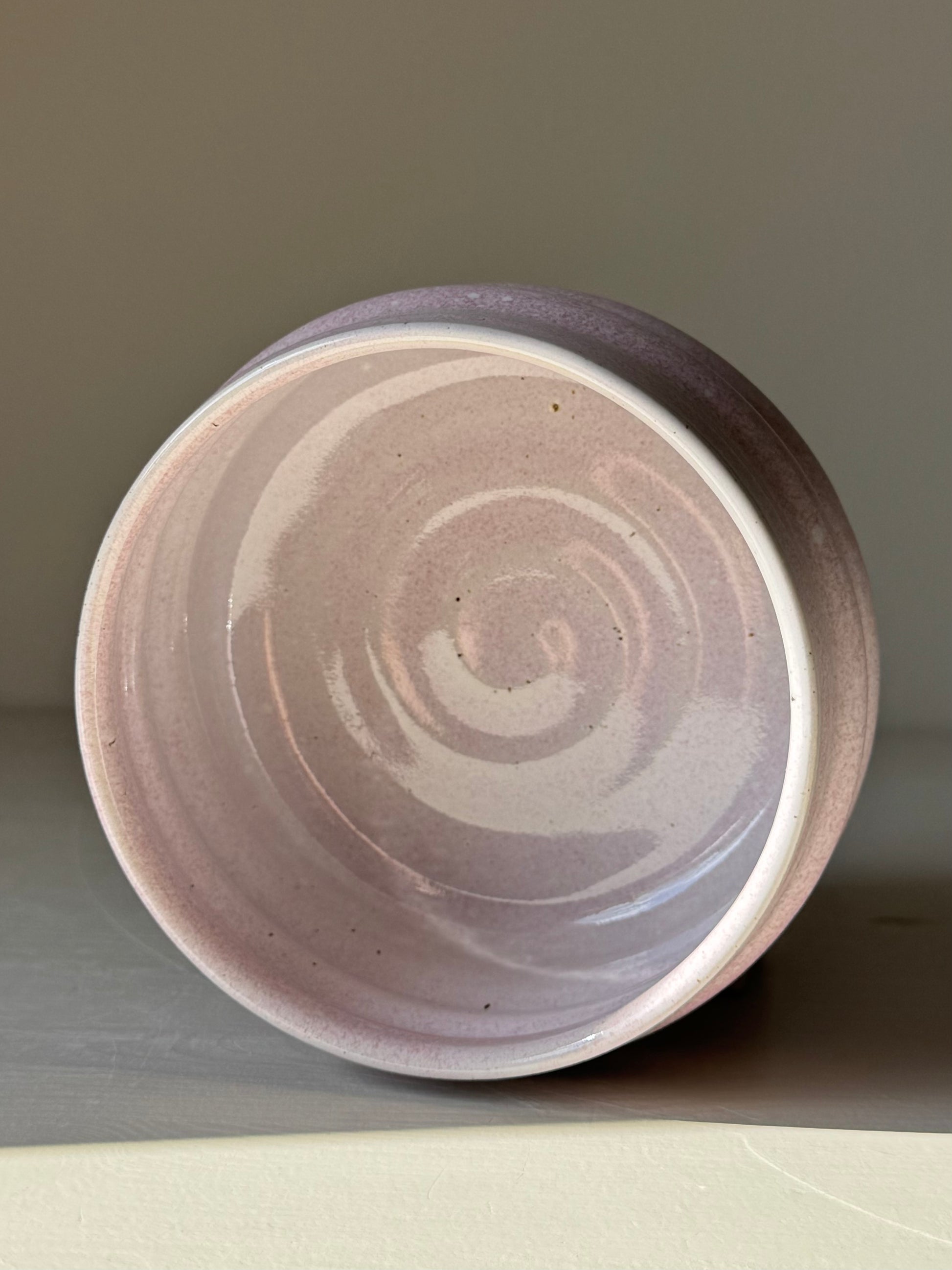 Handmade ceramic Matcha Bowl - Pale Pink with soft swirling glaze and sculpted ridges, exuding a delicate yet strong allure.