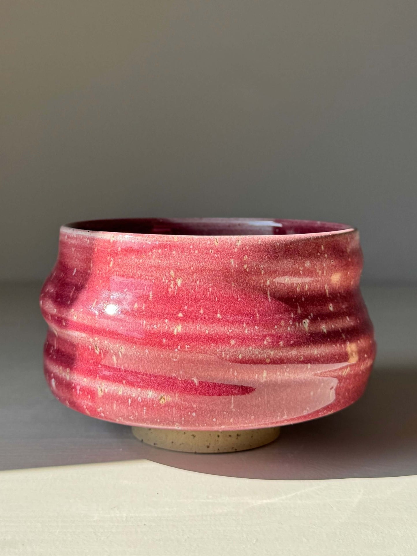 Matcha Bowl - Ume Series #04 handcrafted ceramic with a rounded shape and flowing ridges inspired by Japanese Ume blossom color.