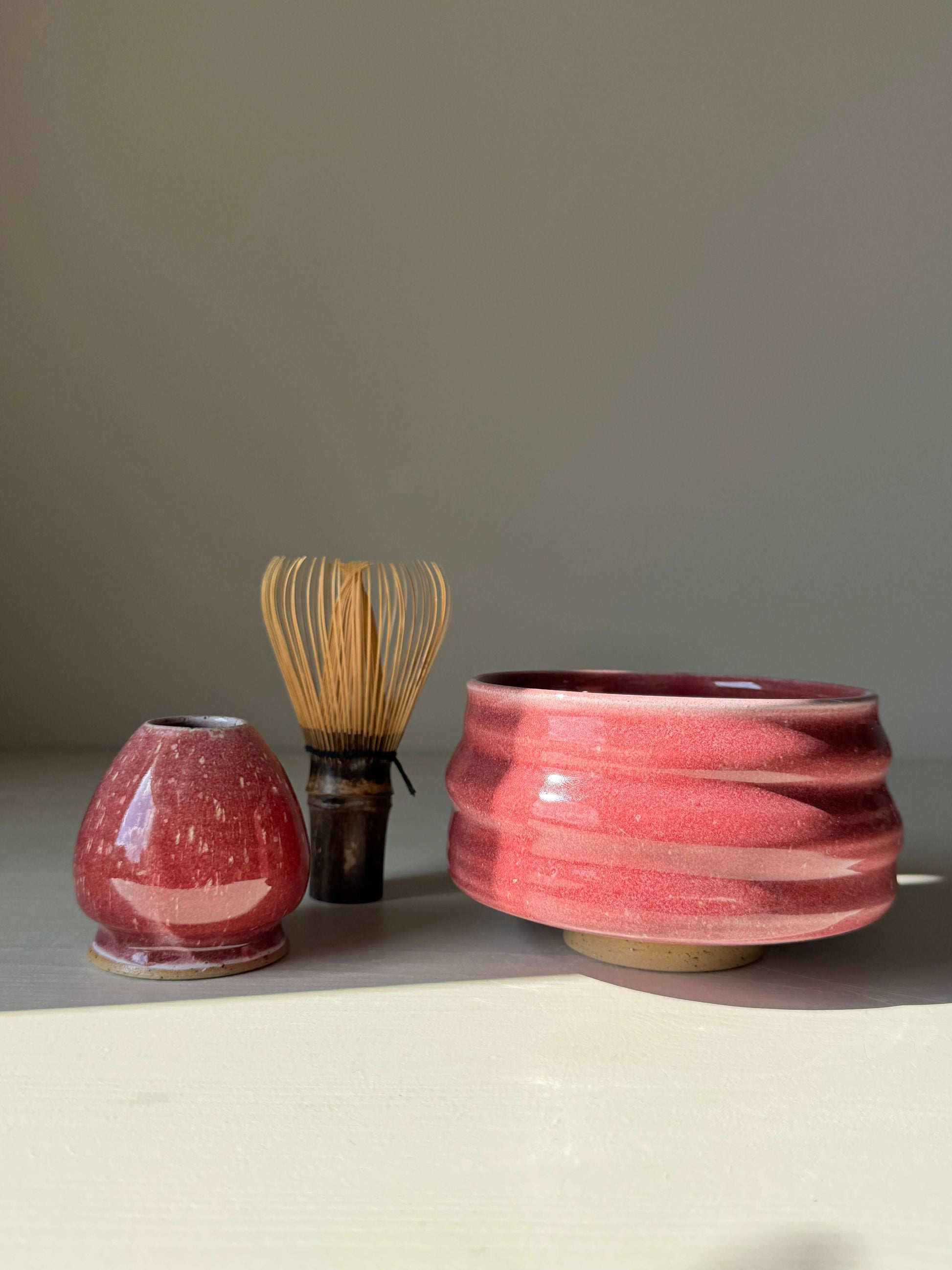 Handmade ceramic Matcha Bowl - Ume Series #06 with whisk and holder, inspired by Japanese Ume blossom, showcasing resilience and beauty.