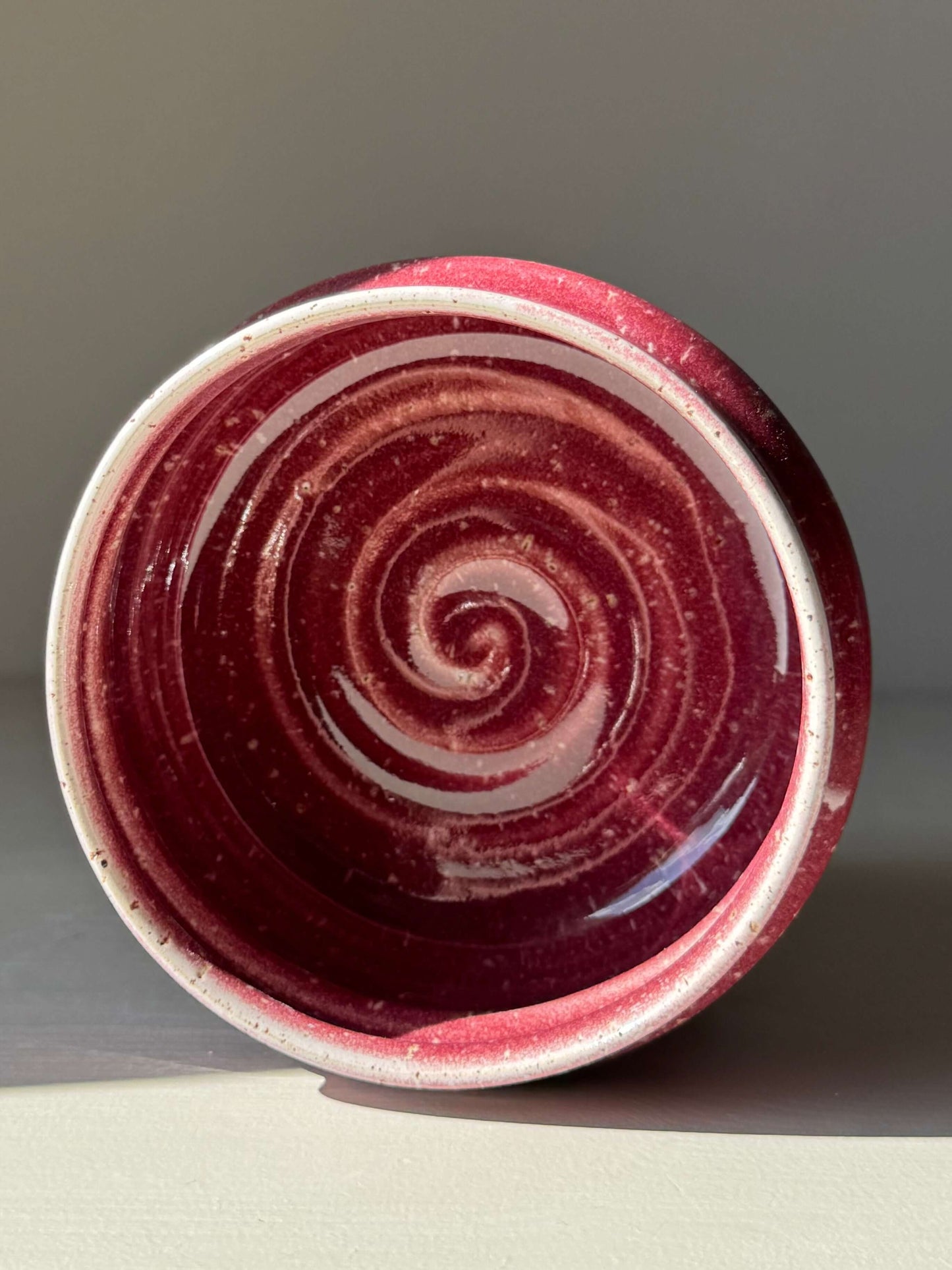 Matcha Bowl - Ume Series #03, handmade ceramic with unique spiral design and rich red hue inspired by Japanese Ume blossom.