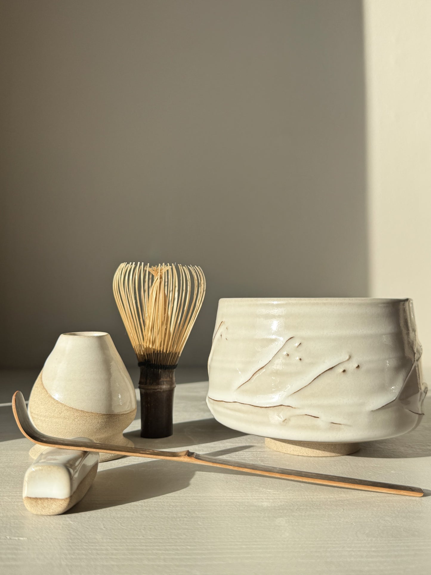 Matcha Bowl – Yuki Branches #02 with traditional tea utensils, featuring soft ivory glaze and delicate slip lines.
