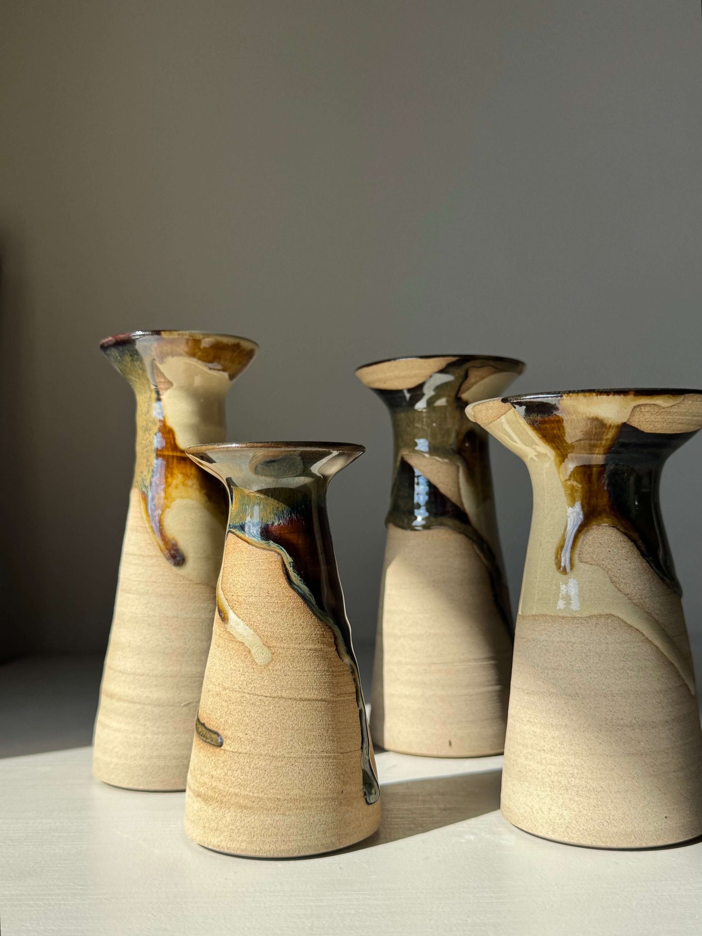 Handmade ceramic Medium Vase – Inyo Series #04 with unique glaze patterns and tall, flared silhouette.
