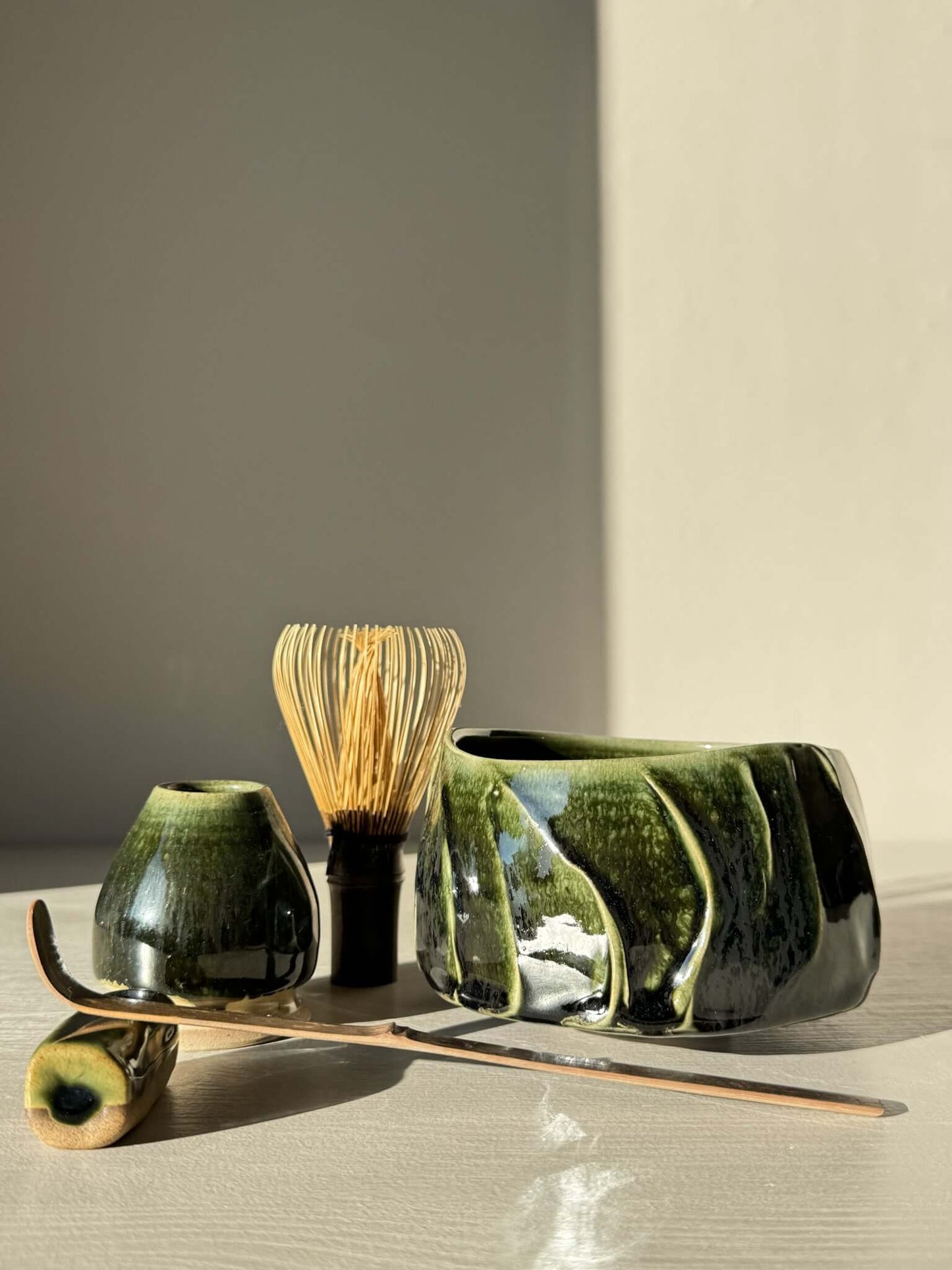 Textured Matcha Bowl - Hinoki #10 with green glaze and unique textures, part of the Hinoki Series, enhancing matcha rituals with natural beauty.