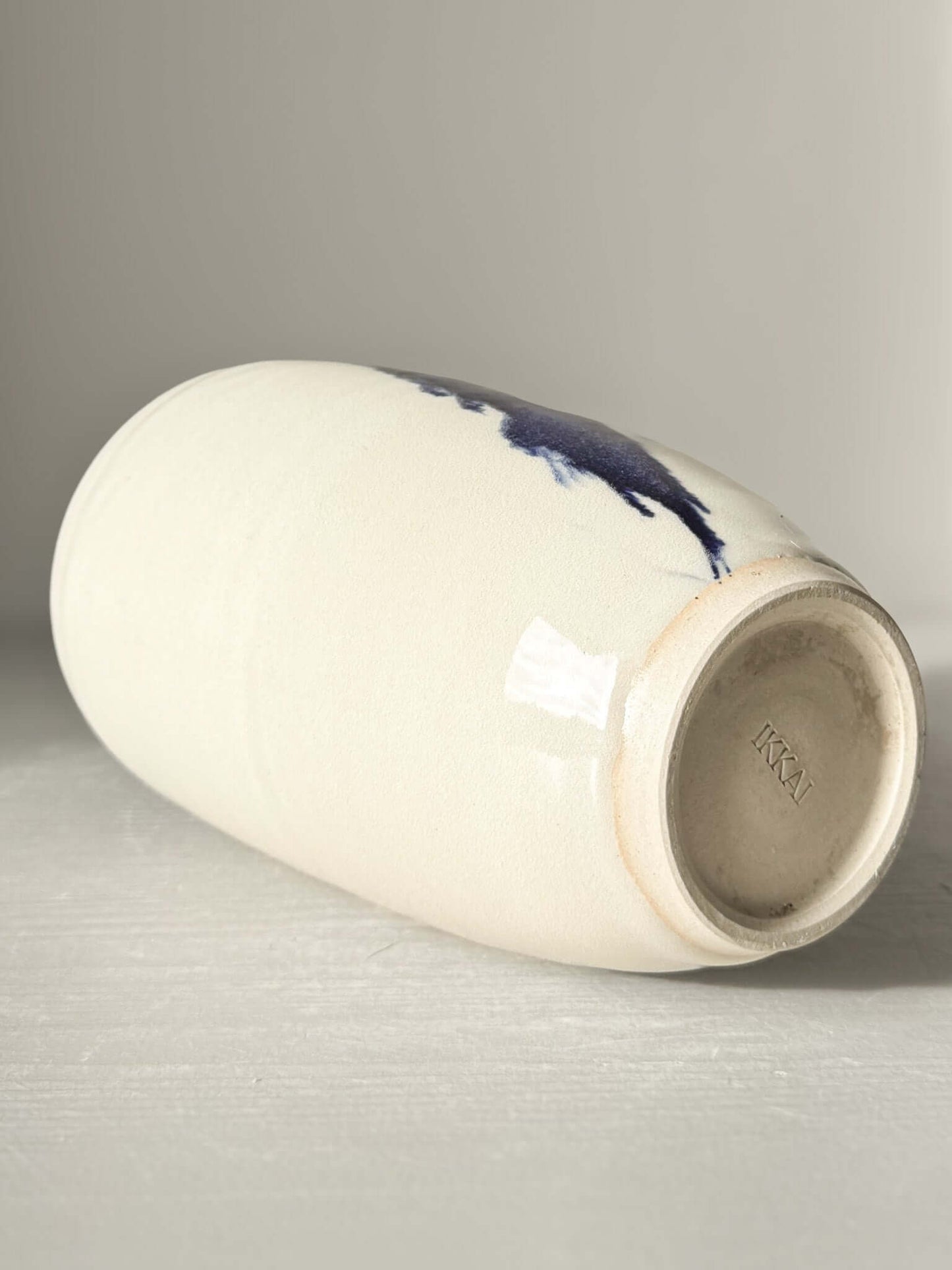 Ceramic Vase - Gosu #08 with hand-splashed cobalt blue accents and glossy finish, showcasing a unique, modern design.