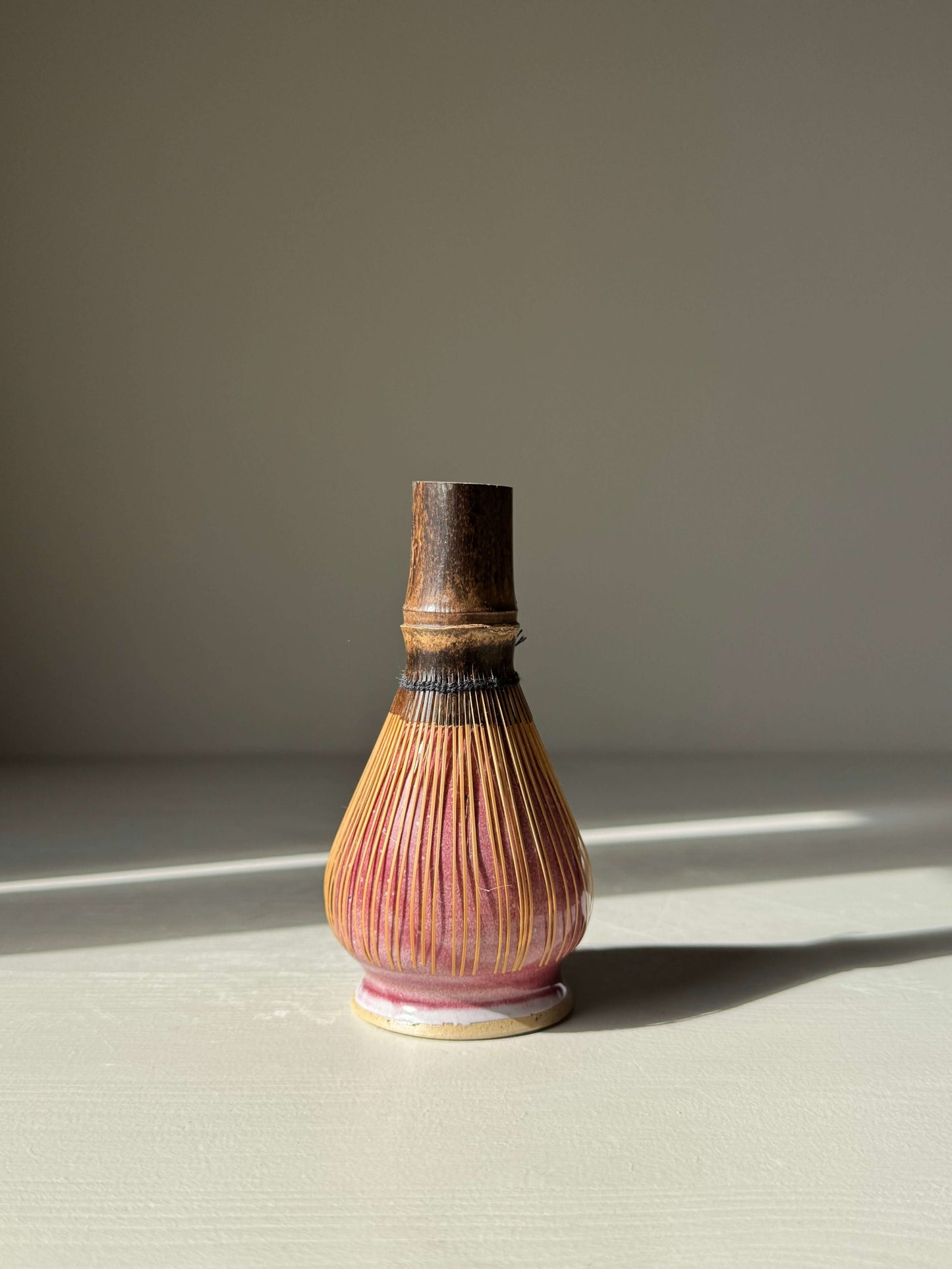 Handmade ceramic Whisk Holder - Ume Series inspired by Japanese plum blossom, designed for drying and preserving bamboo matcha whisks.