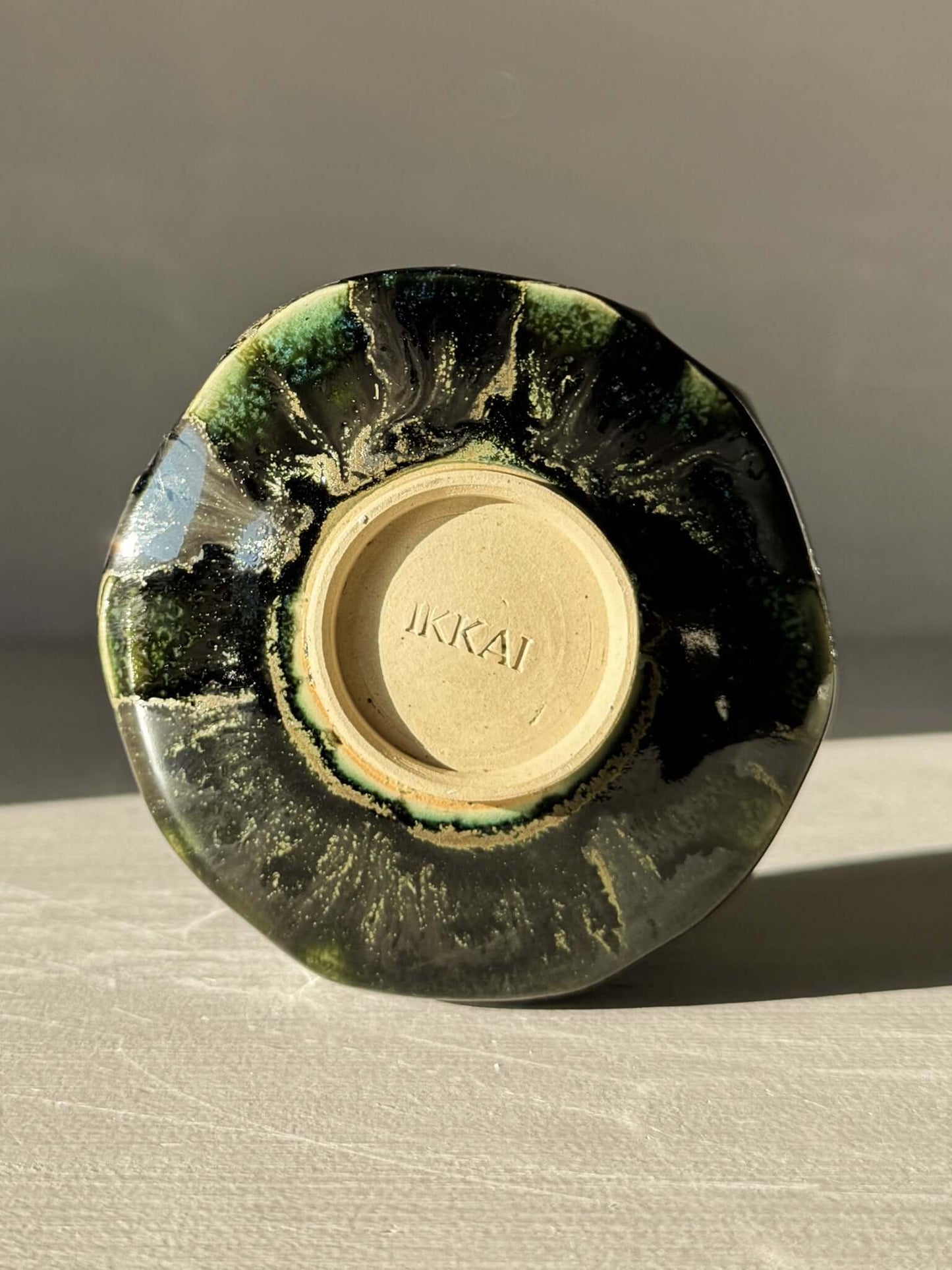 Underside view of Yunomi Cup - Hinoki #03 with green glaze pattern