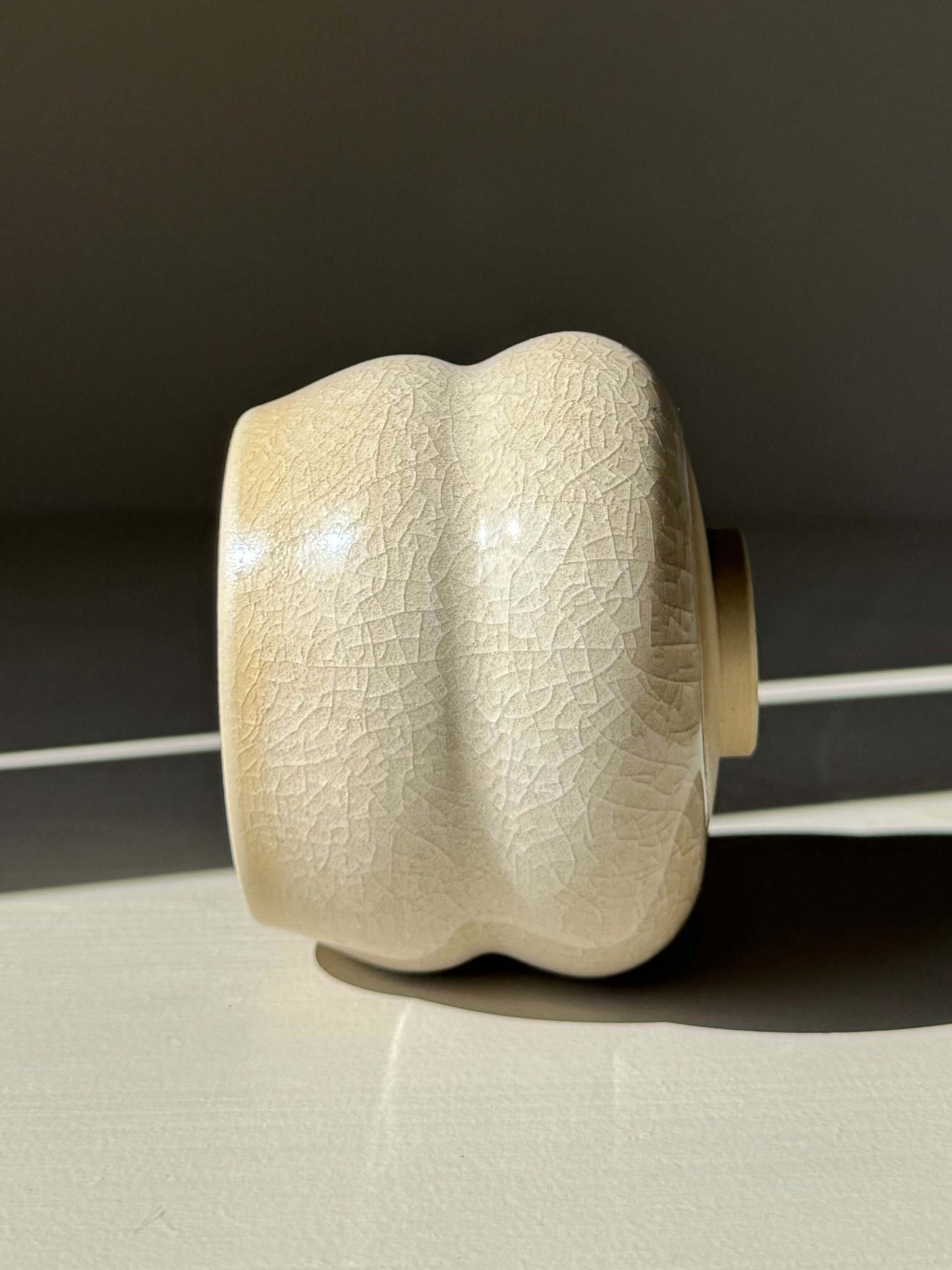 Yunomi Cup - Kannyū Series #10, handmade ceramic with crackle glaze showcasing fine lines and elegant texture in compact form.