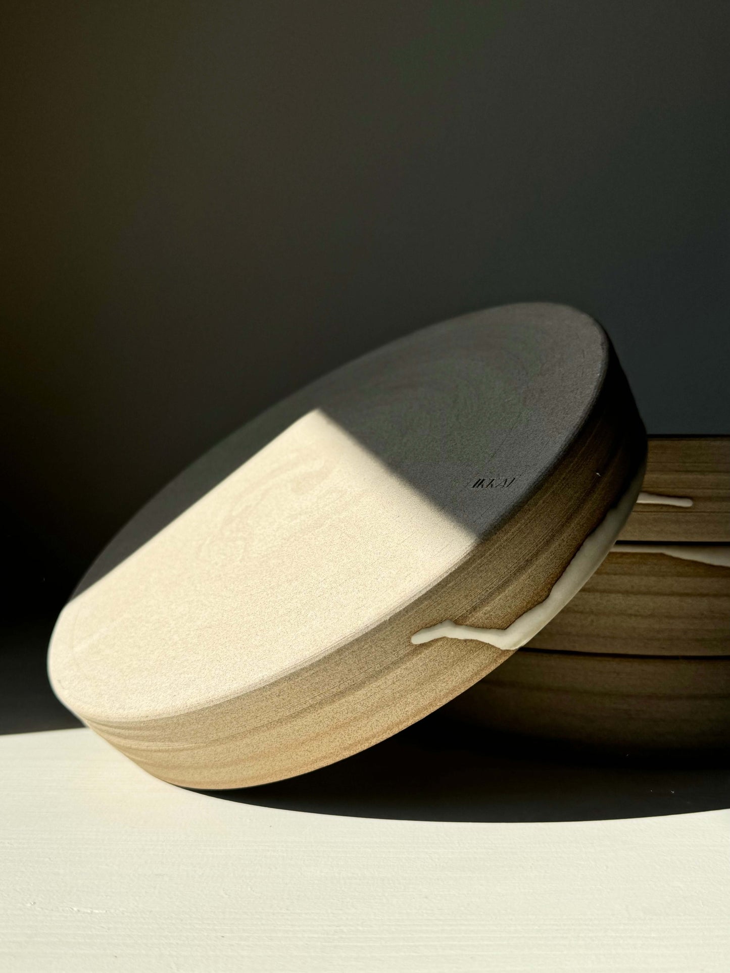 Handmade ceramic Large Plate – Yuki Series with glossy white glaze, earthy toffee clay, and wide open shape, perfect for calming moments.