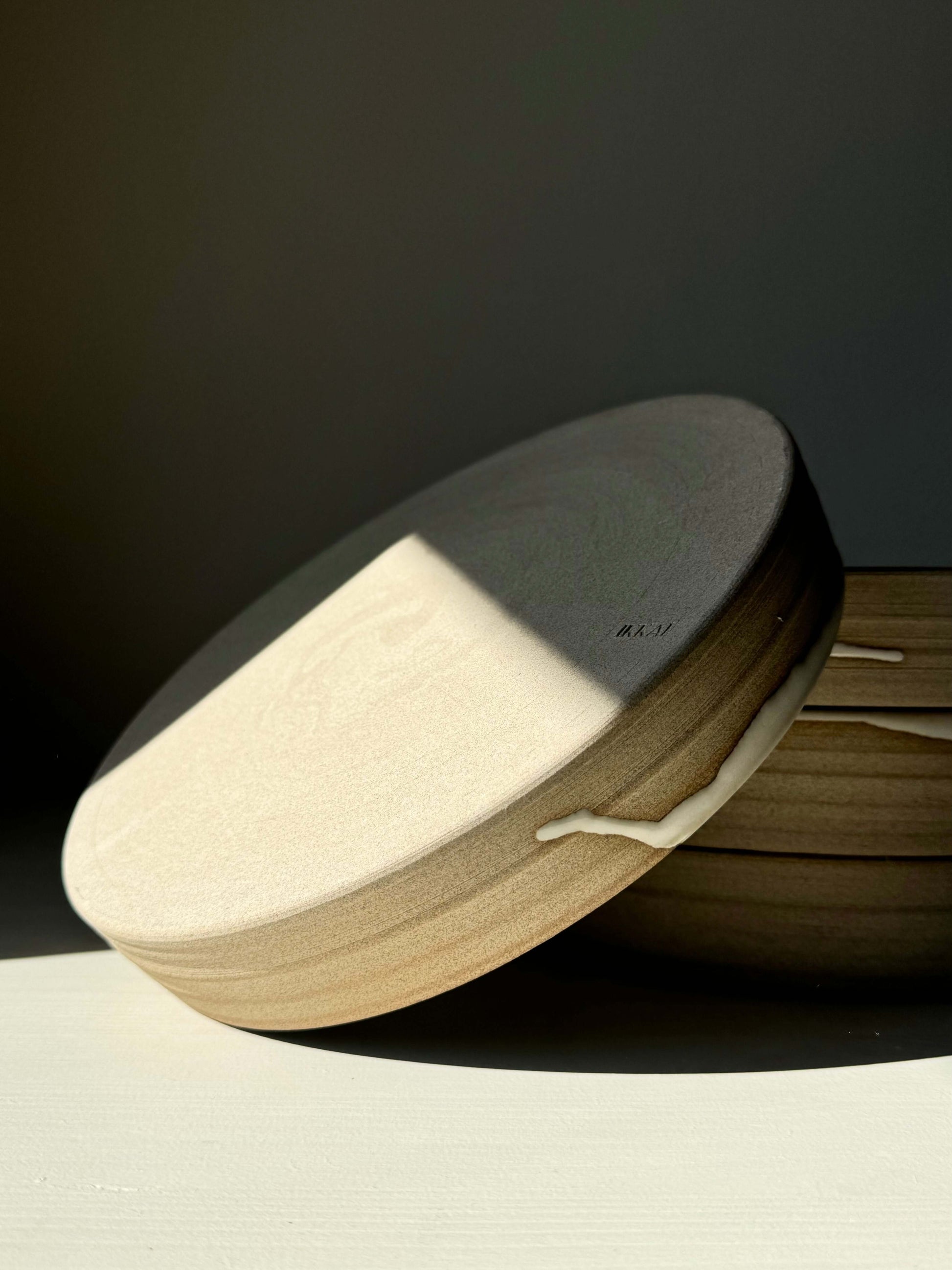 Handmade ceramic Large Plate – Yuki Series with glossy white glaze, earthy toffee clay, and wide open shape, perfect for calming moments.