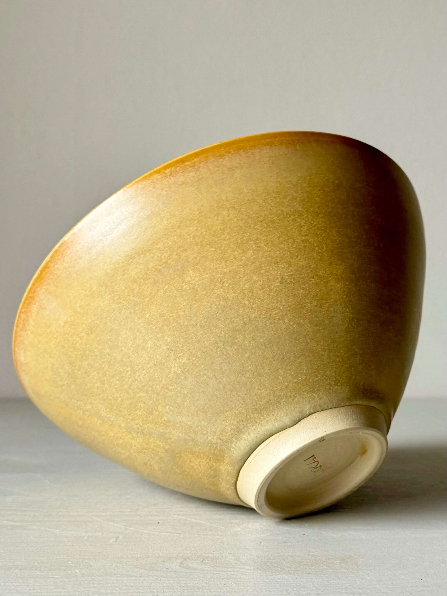 Handmade medium yellow glazed stoneware bowl, perfect for serving breakfast, soups, or desserts. Unique pottery kitchenware.