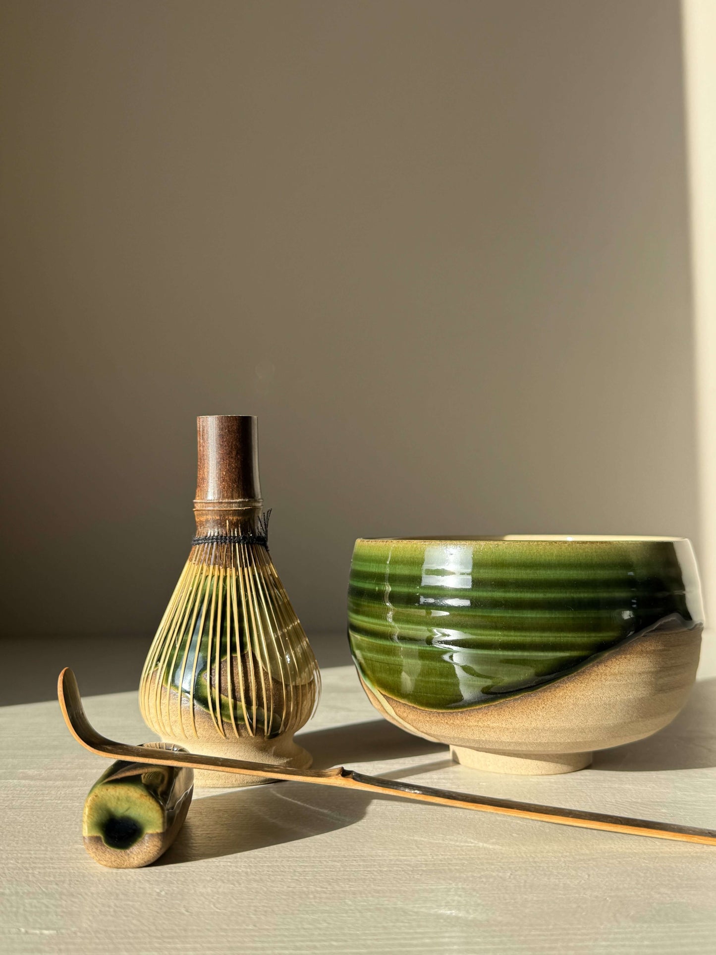 Whisk Holder - Mori with matcha whisk, green-glazed stoneware, and natural finish for tea moments