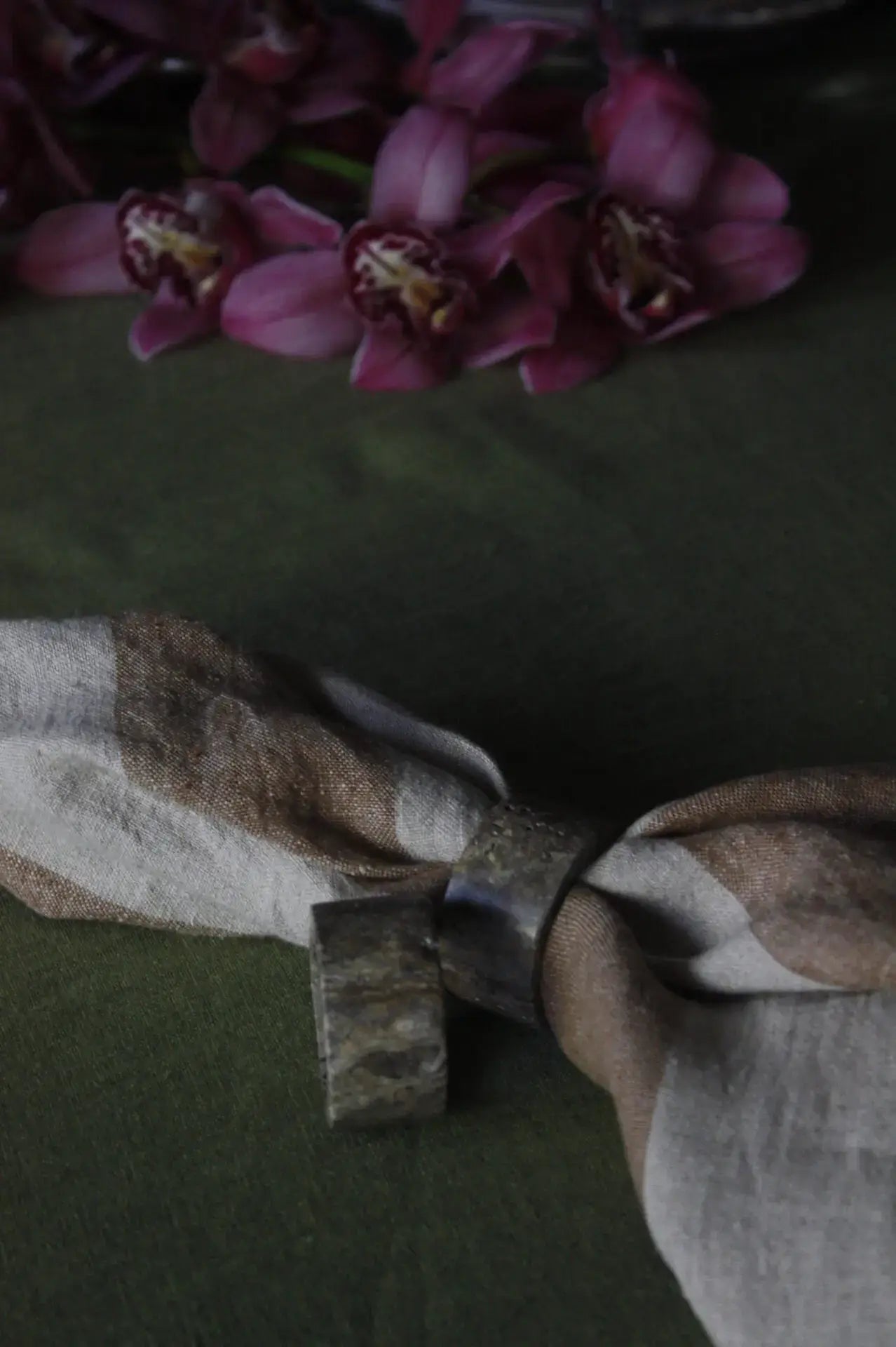 Natural Stone Napkin Ring on linen with flowers