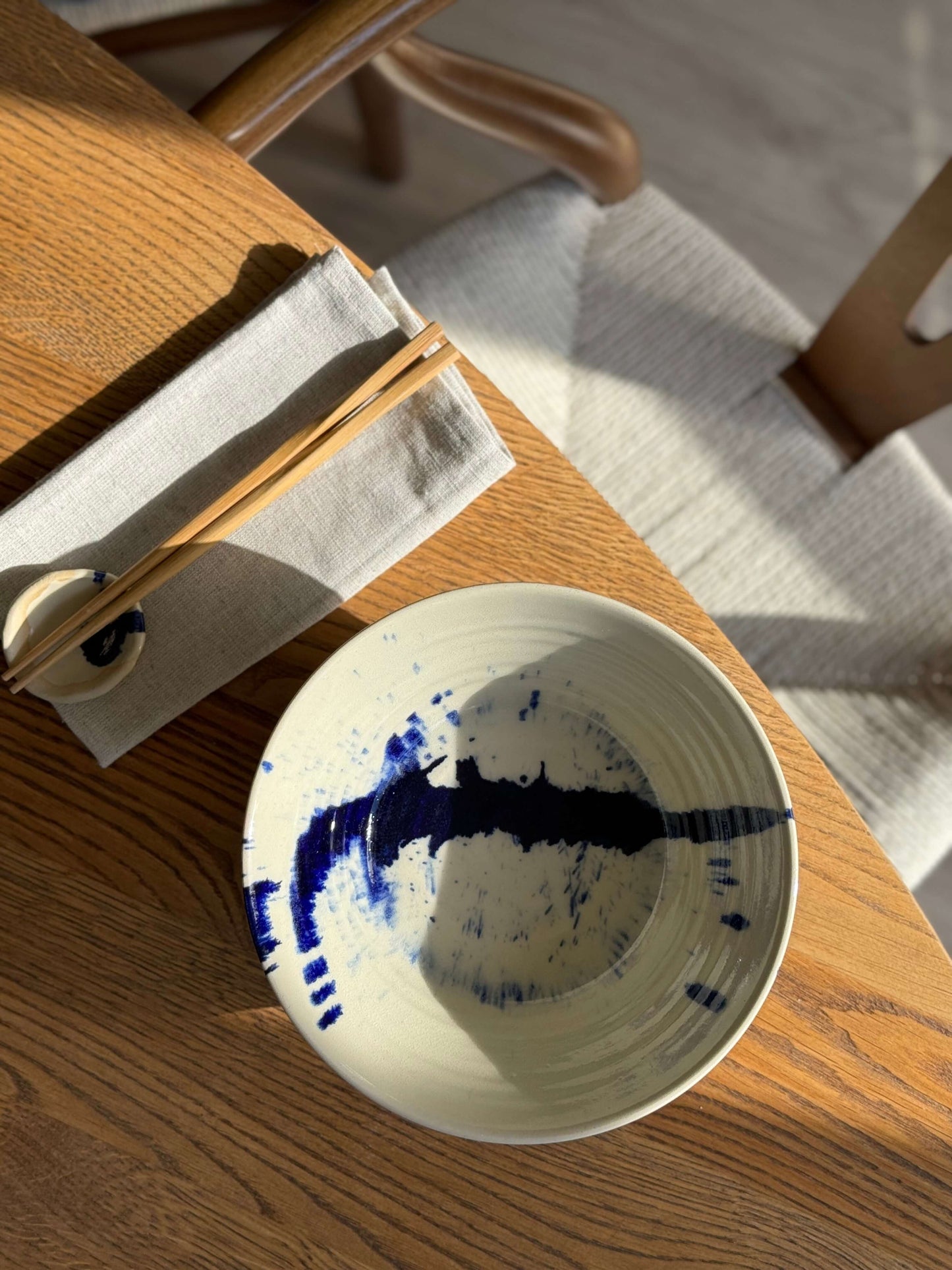Elevated Gosu Series #03 serving bowl with blue abstract design on wooden table, inspired by Japanese traditional forms.