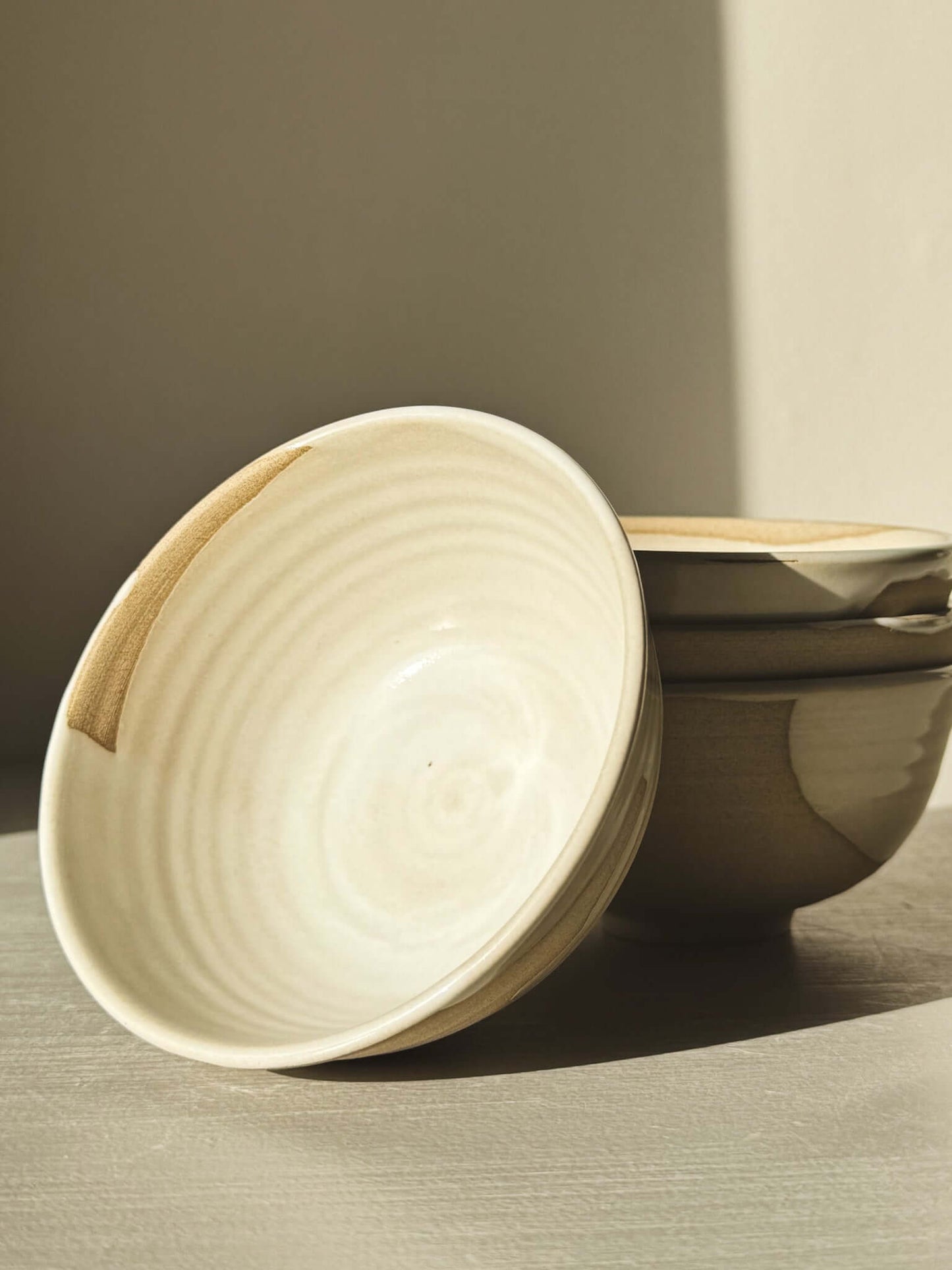Small Bowl - Yuki with white glaze, showcasing organic lines and warm clay highlights, perfect for adding charm to any table setting.