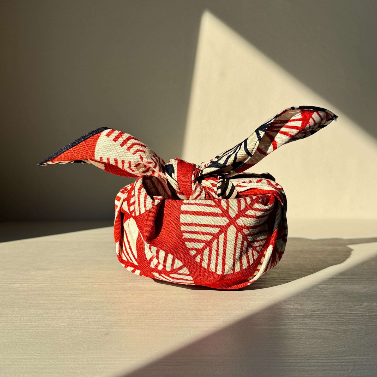 Small Furoshiki - Navy Blue & Red showcasing handmade ceramic wrap, inspired by pine longevity, in cotton, 48cm size.