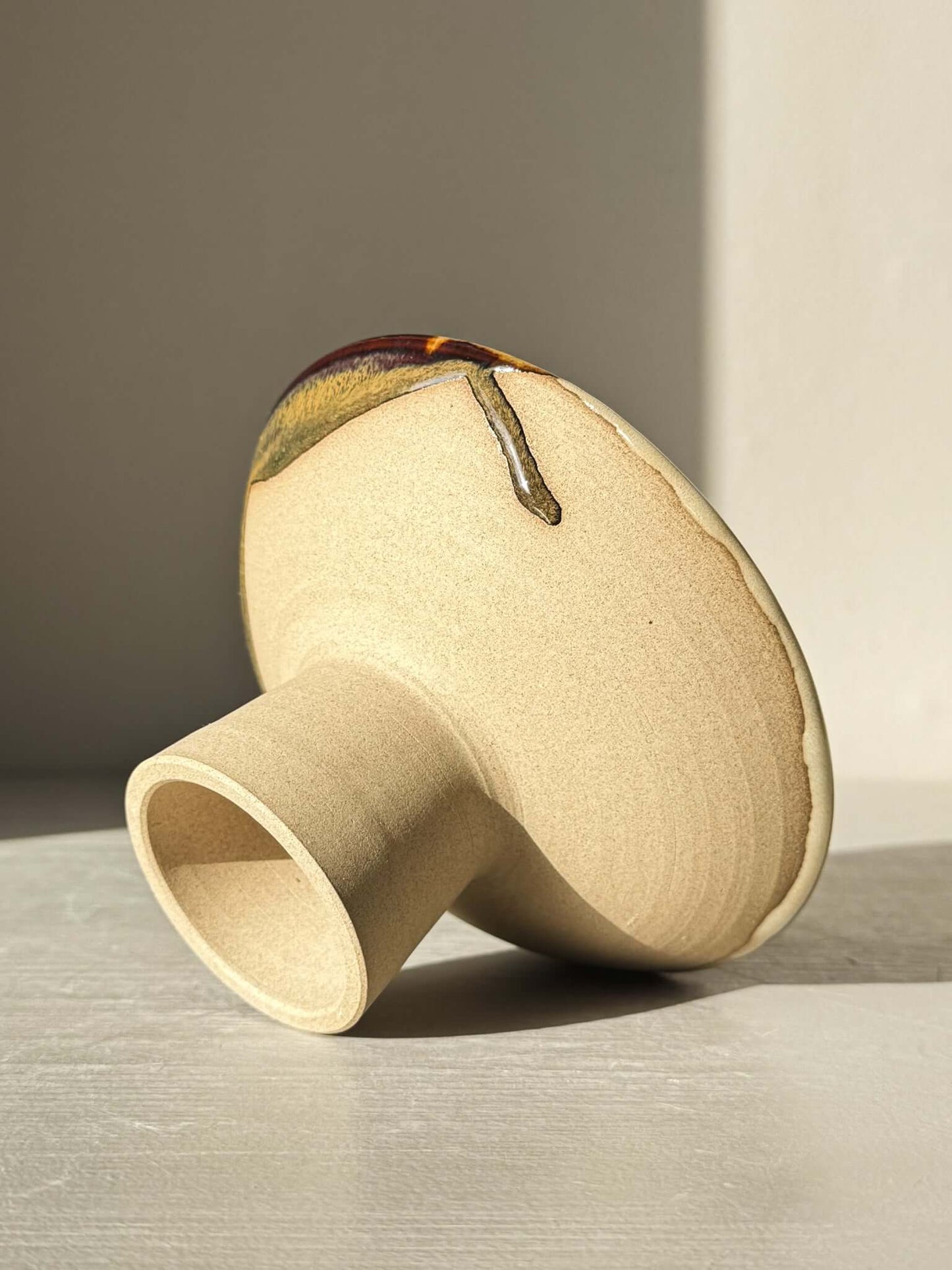 Small Pedestal Bowl - Inyo #01, sculptural design with glaze in gold, brown, blue, and green, highlighting unique craftsmanship.