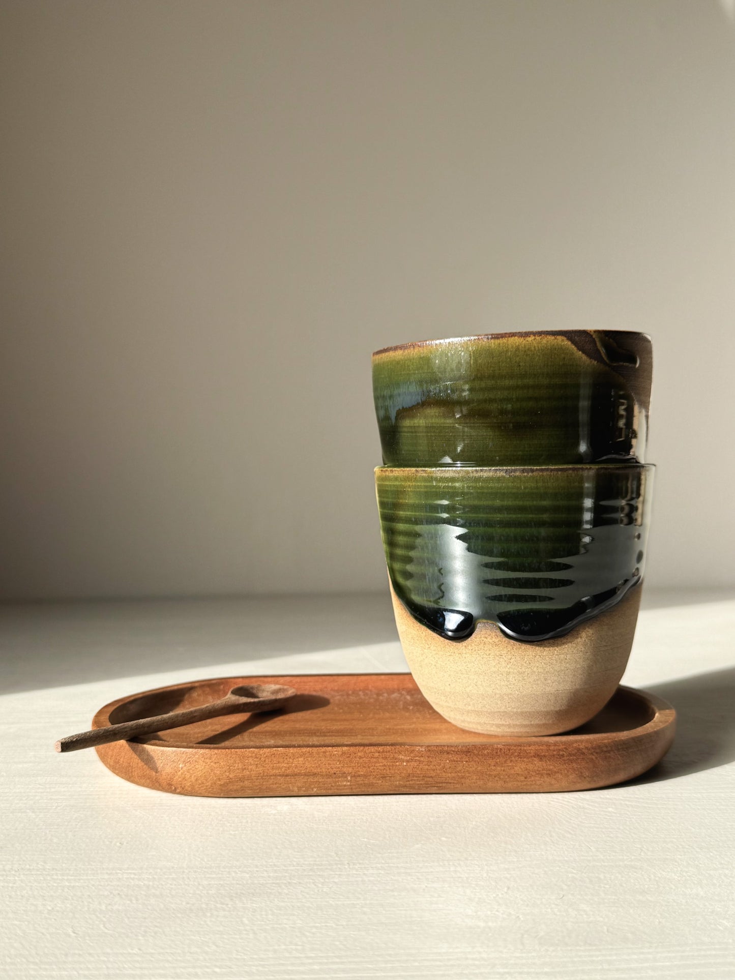 Stackable Latte Cups - Mori in green and clear glaze on wooden tray with spoon