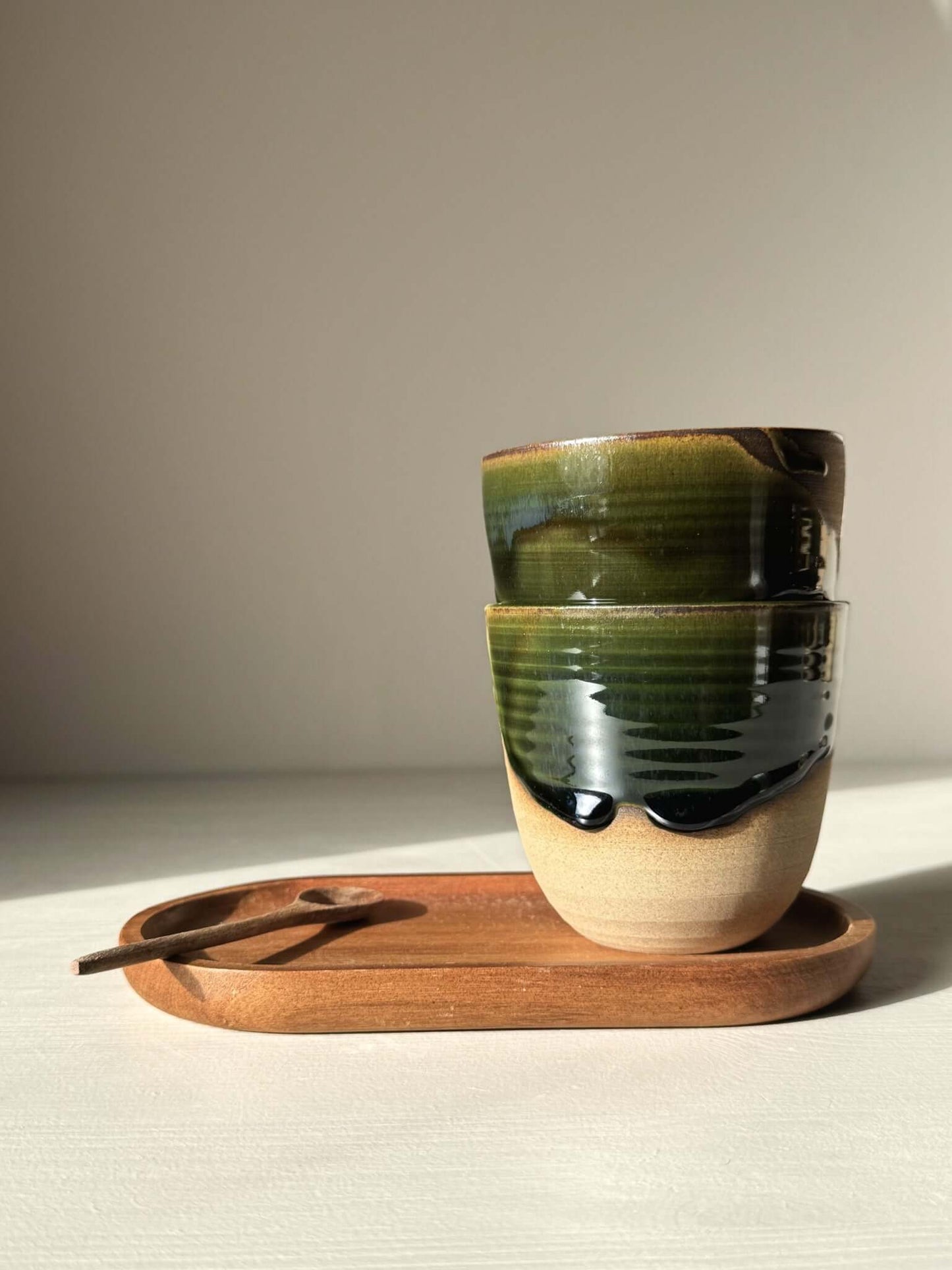 Stackable Latte Cups - Mori in green and clear glaze on wooden tray with spoon