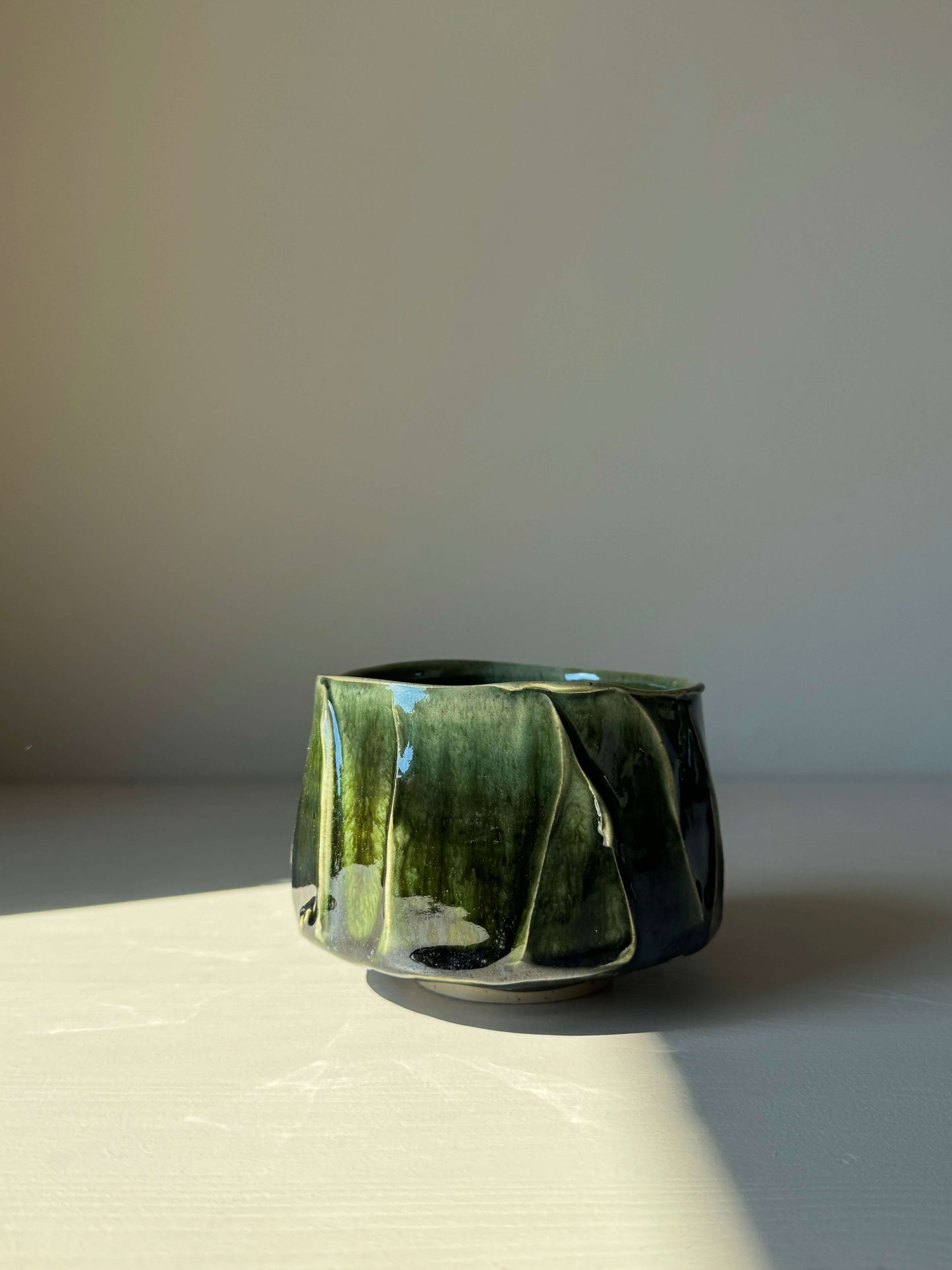 Textured green matcha bowl from Hinoki Series, inspired by calming Hinoki tree hues, with unique glaze and design.
