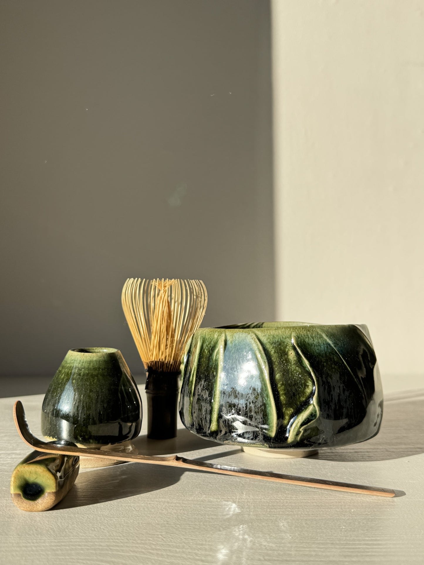 Textured Matcha Bowl - Hinoki #17 with green glaze and accessories, inspired by Hinoki tree hues, perfect for enhancing matcha ritual.