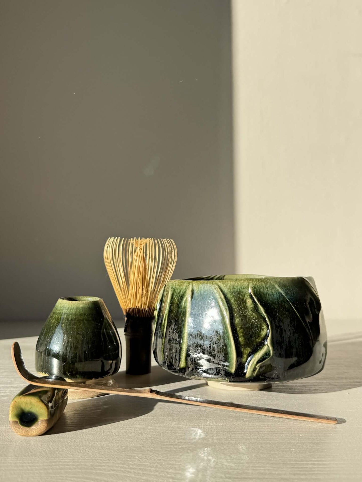 Textured Matcha Bowl - Hinoki #17 with green glaze and accessories, inspired by Hinoki tree hues, perfect for enhancing matcha ritual.