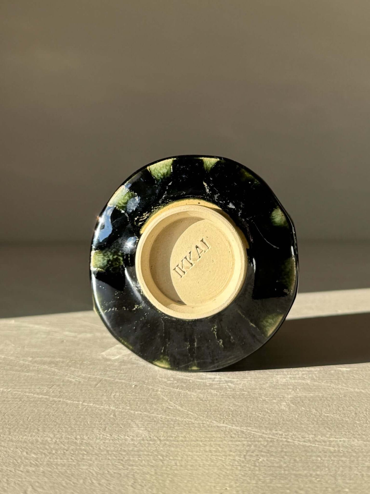 Bottom view of Yunomi Cup - Hinoki #16 showing detailed glaze and craftsmanship.