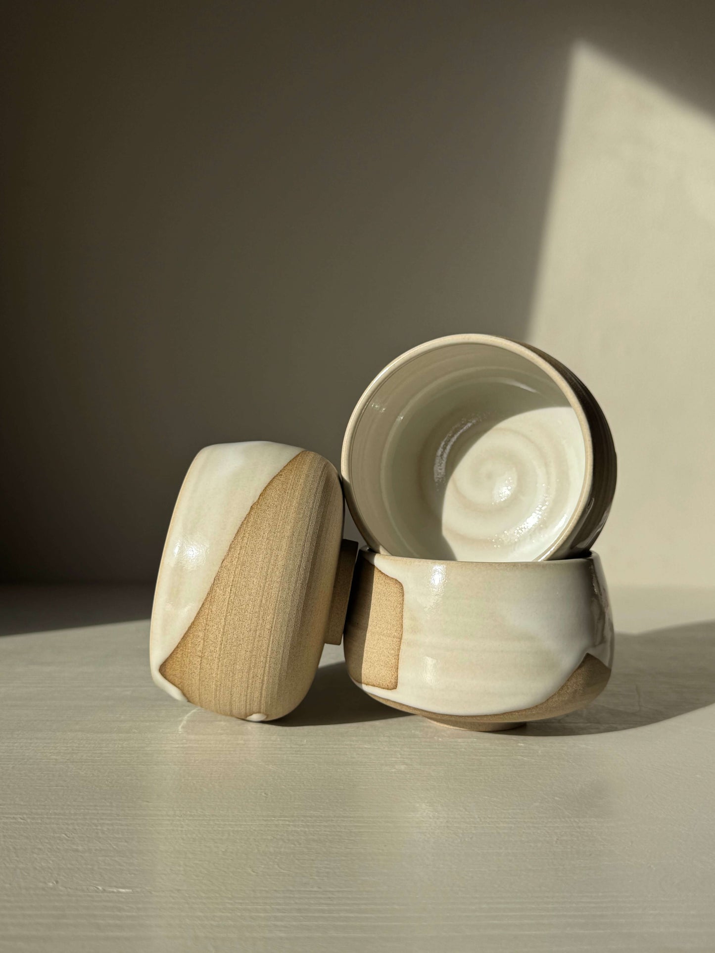 Handmade ceramic Coffee cups - Yuki series in toffee clay with white glaze.