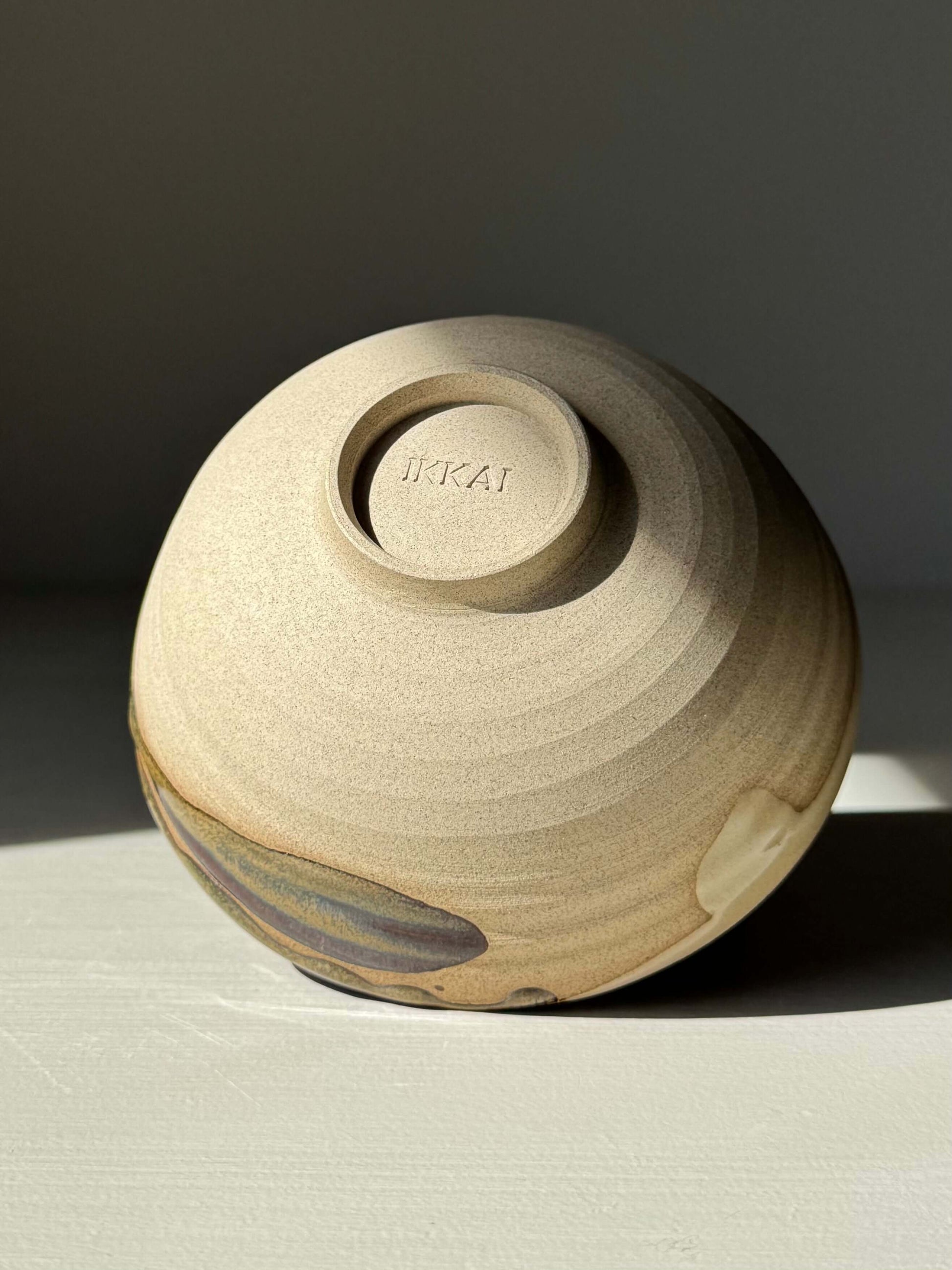 Small Bowl - Inyo Series handmade ceramic, showcasing a raw stoneware body with a unique glaze pattern under natural lighting.