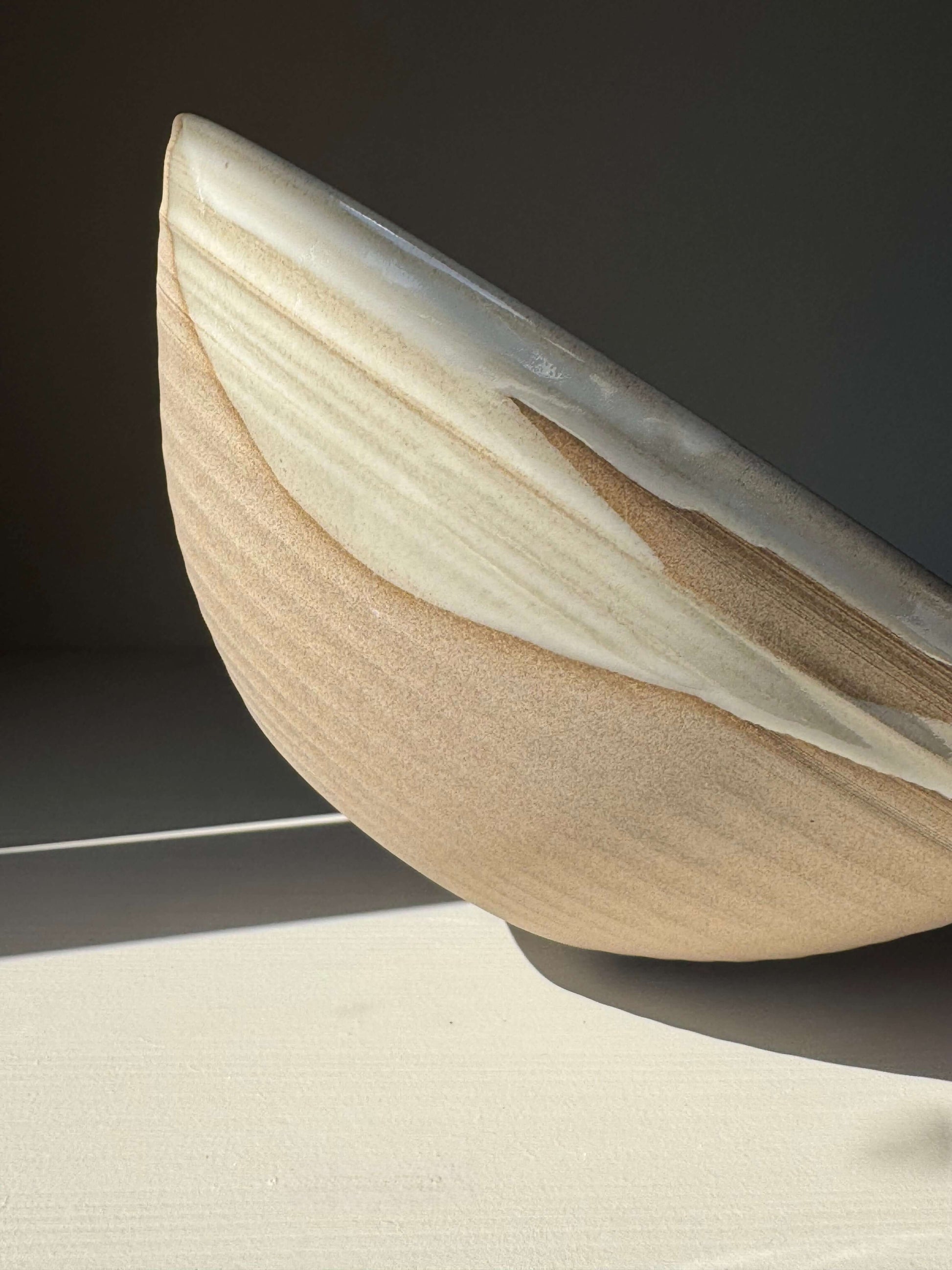 Large Bowl - Yuki Series handmade ceramic with white glaze and raw clay, showcasing an earthy and sculptural design.