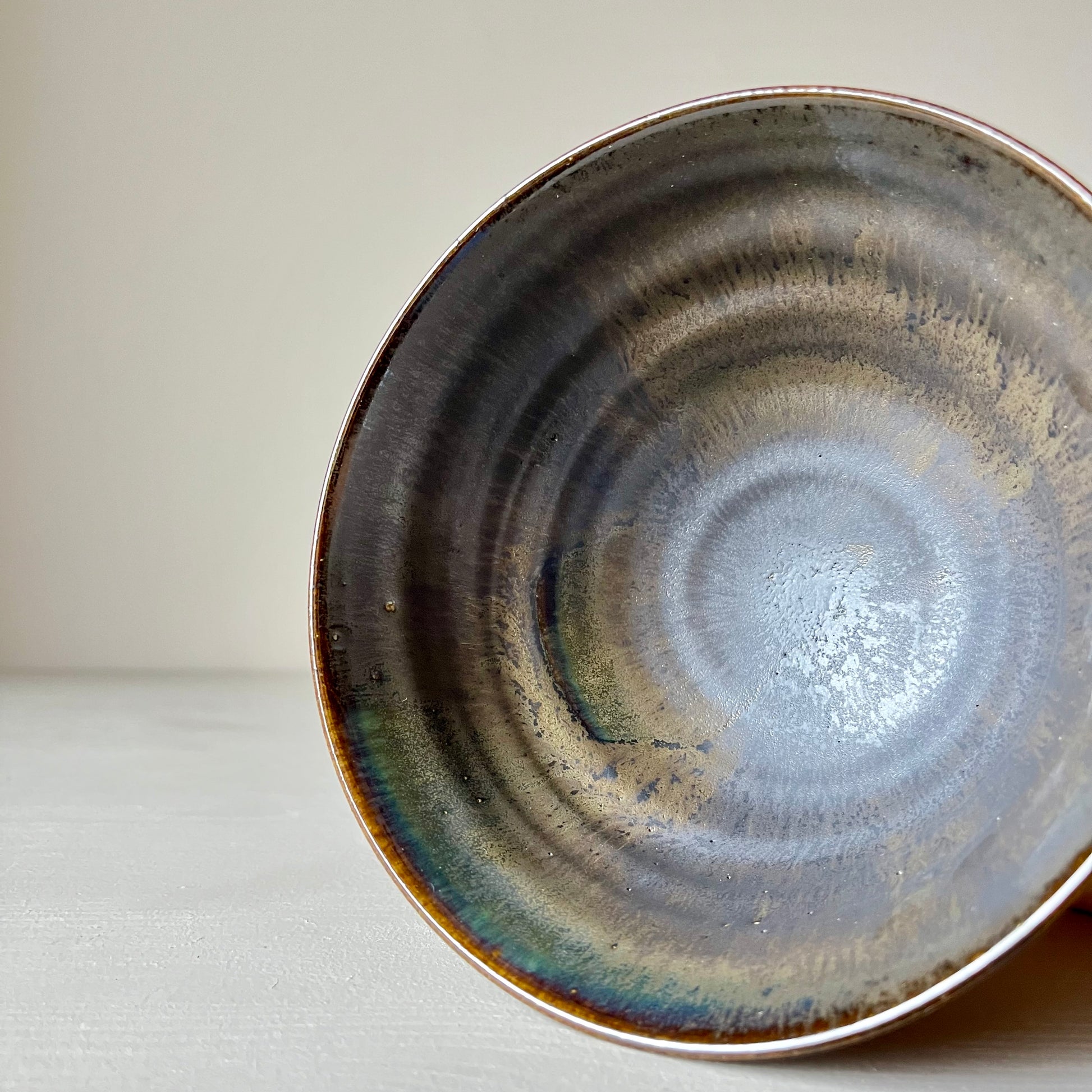 Inside view of a black ceramic matcha bowl