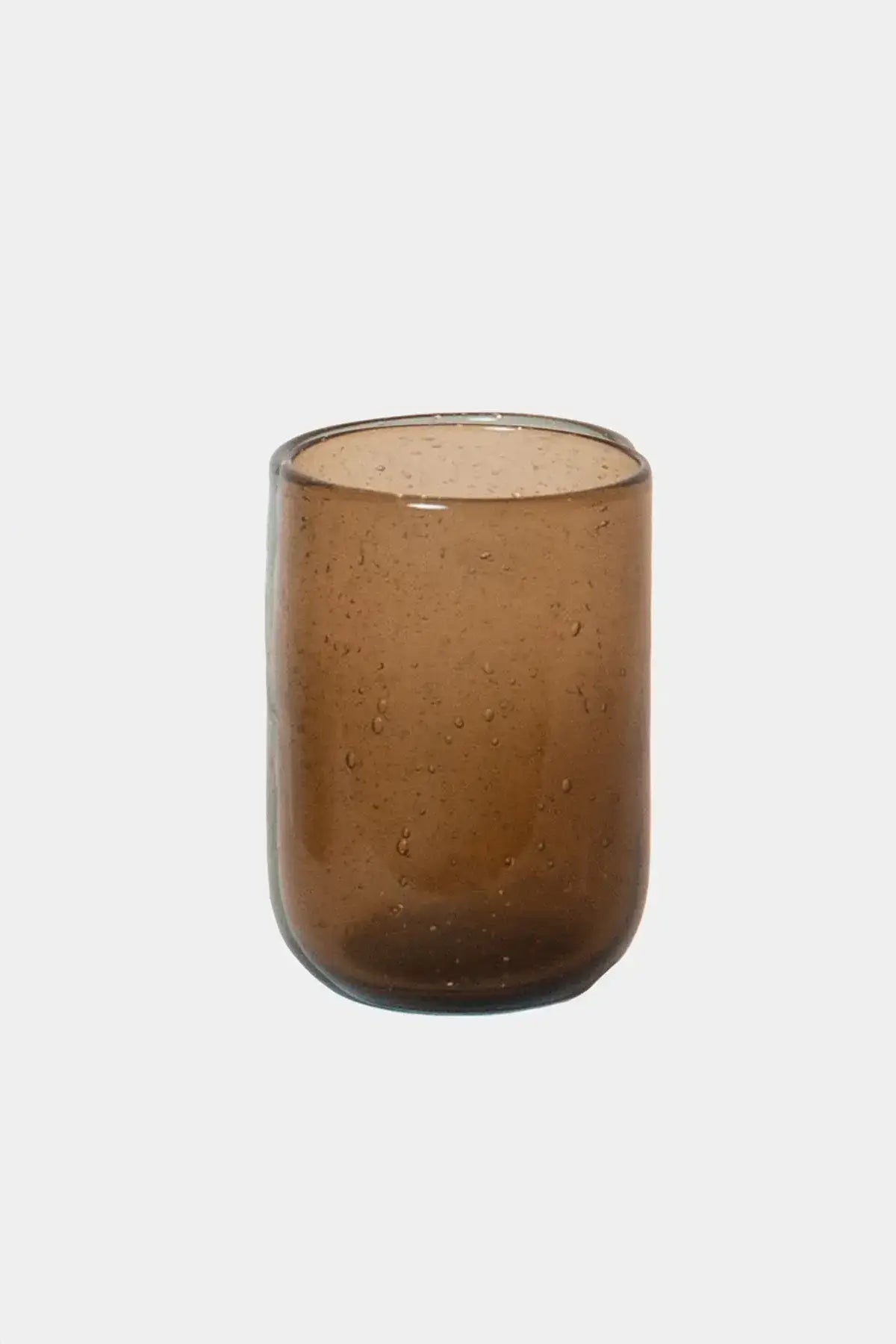 Bari Glass – Brown with tiny bubbles, unique rounded shape, perfect for water or juice, offering a calm and natural grip.