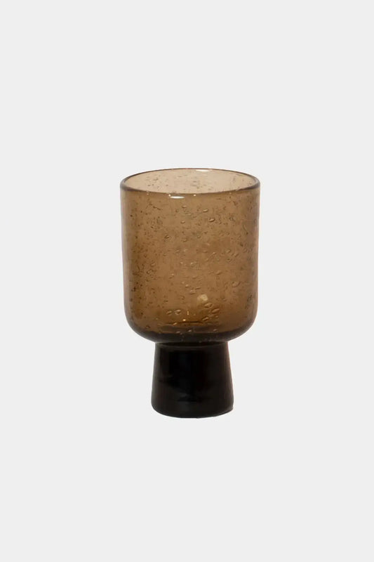 Bari Glass on Foot – Brown with natural bubbles and soft tone, perfect for water or wine. Unique handmade design enhances any decor.