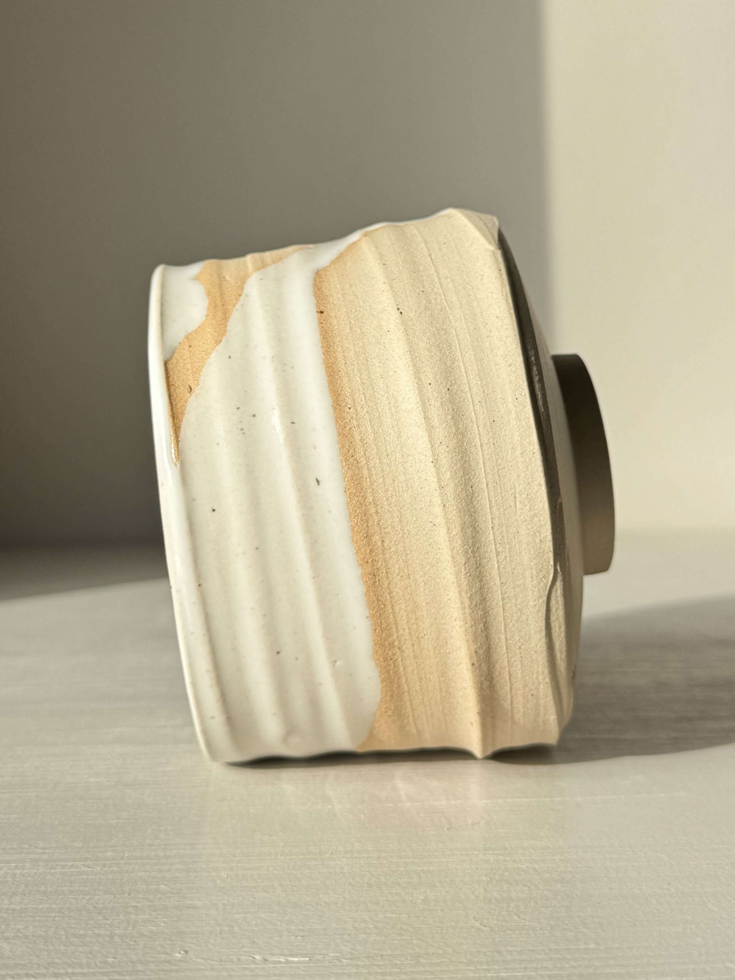 Matcha Bowl – Half Glossy White Glaze #02, handmade ceramic with speckled stoneware clay and tactile surface showing wheel rhythm.
