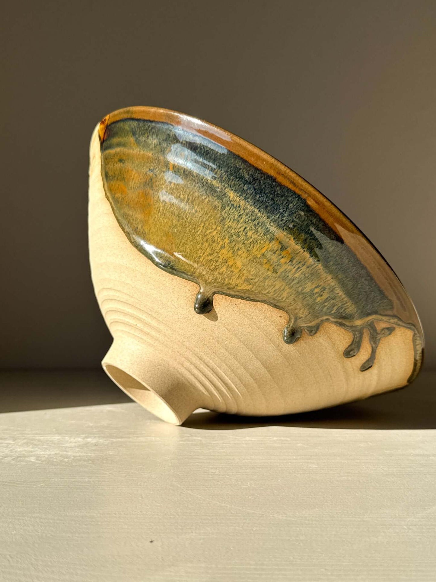 Medium Bowl - Inyo #01 with sculptural design and golden tones, featuring a carved exterior with artistic drips.