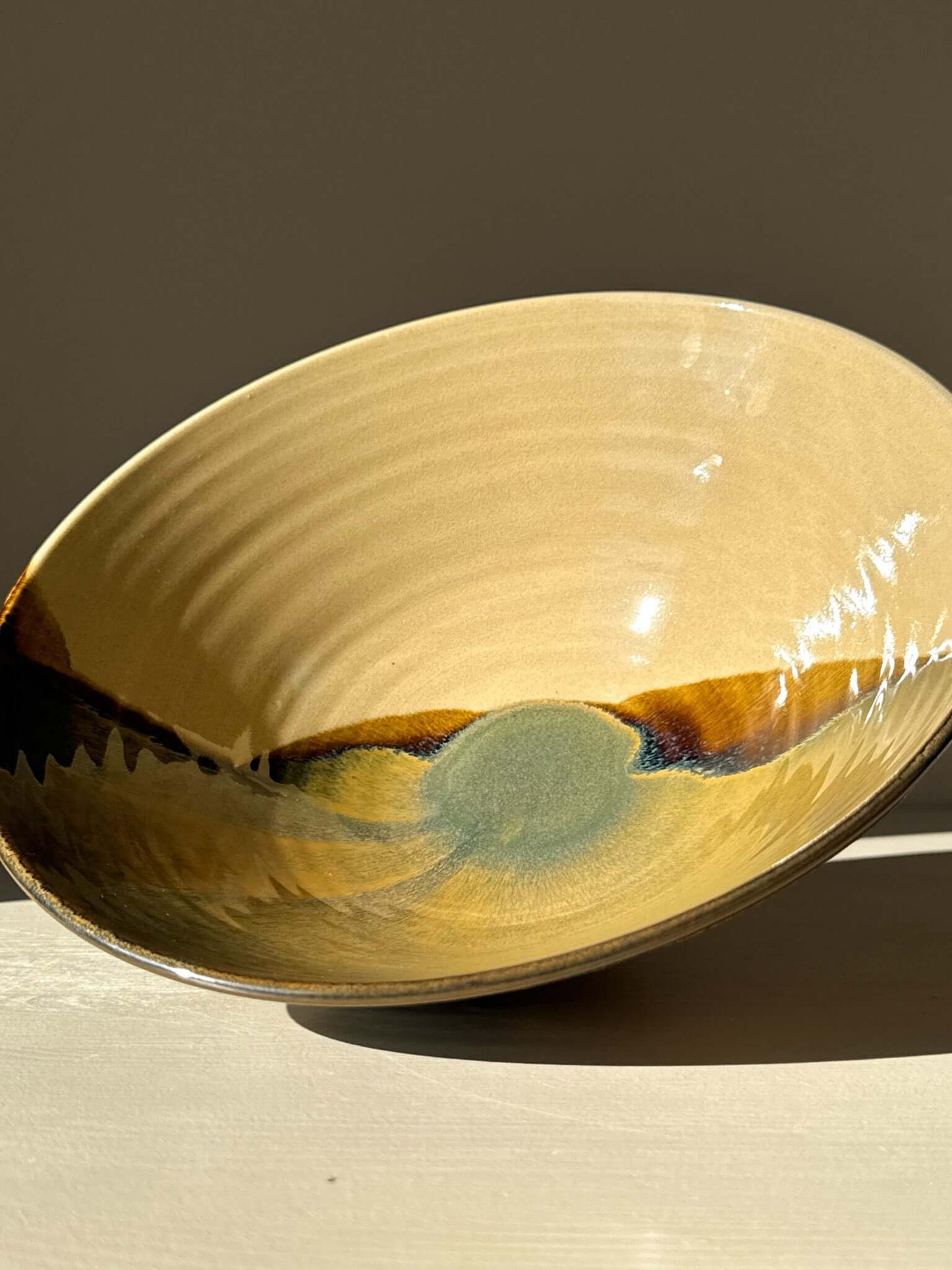 Medium Bowl - Inyo #01 with sculptural design, featuring golden, brown, blue, and green tones, perfect for salads and pasta.