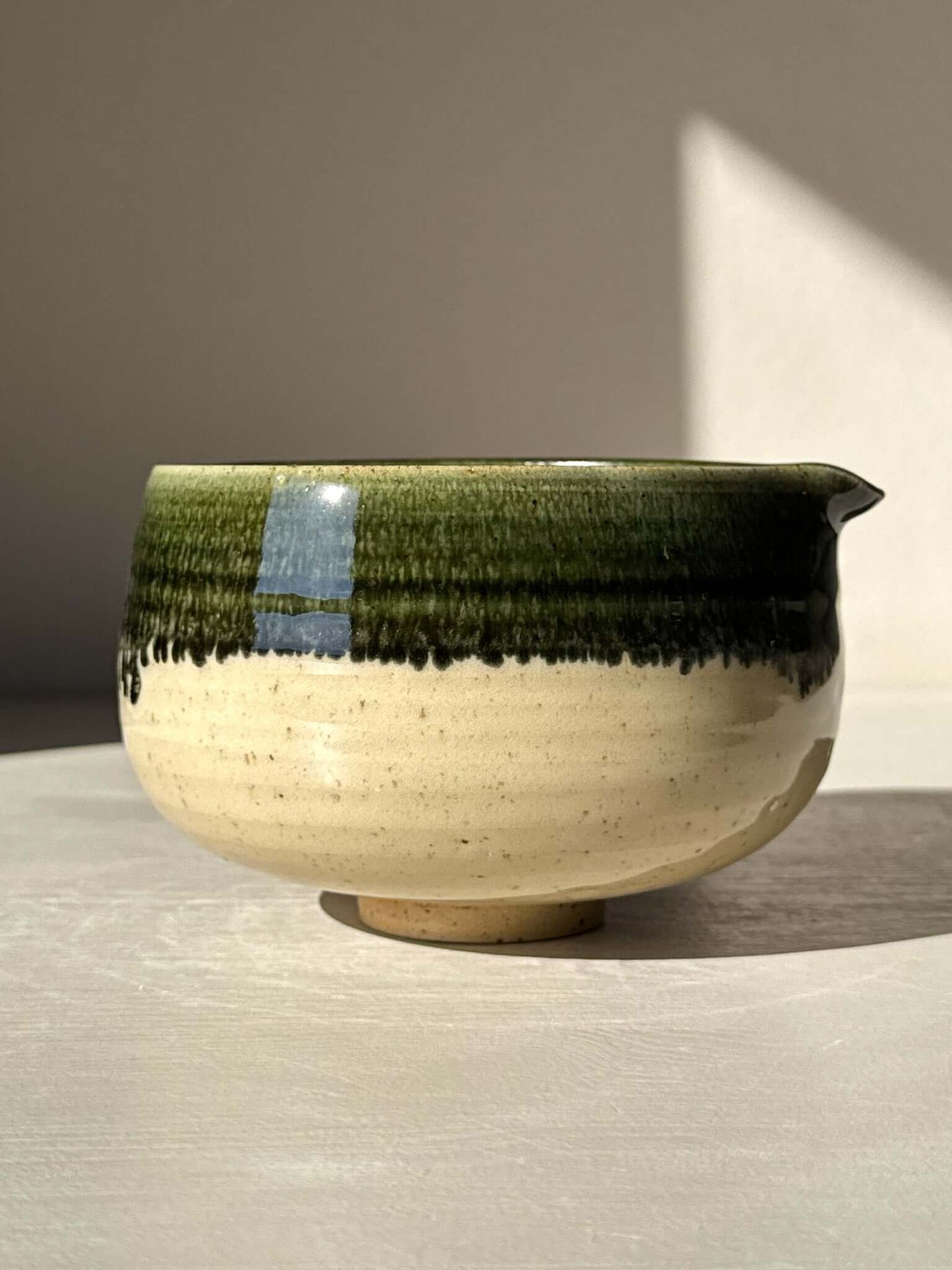 Ceramic Matcha Bowl with Spout - Green Rim #03, featuring a glossy clear finish and traditional Japanese-style design for whisking tea.
