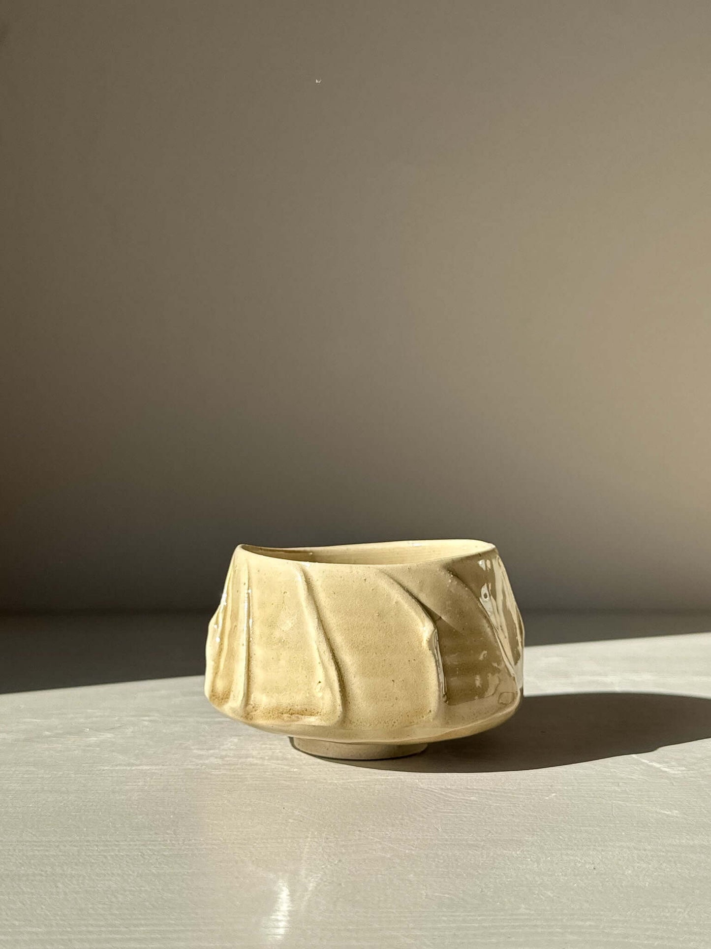 Yunomi Cup - Beige with natural glaze texture, showcasing soft beige color and flowing slip patterns, perfect for elegant tea serving.