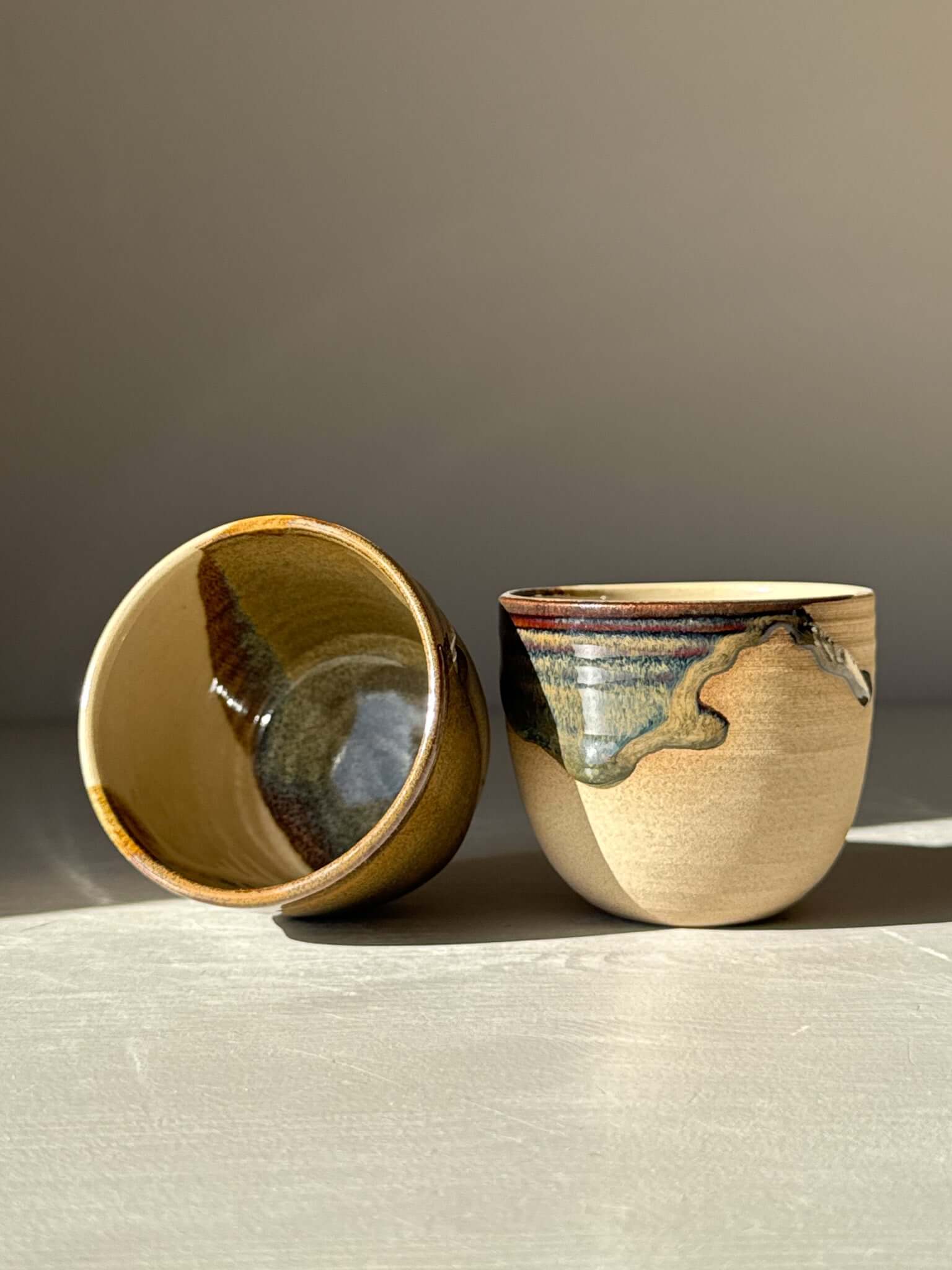 Espresso Cup - Inyo Series showcasing earthy tenmoku glaze and warm clay in a unique design.