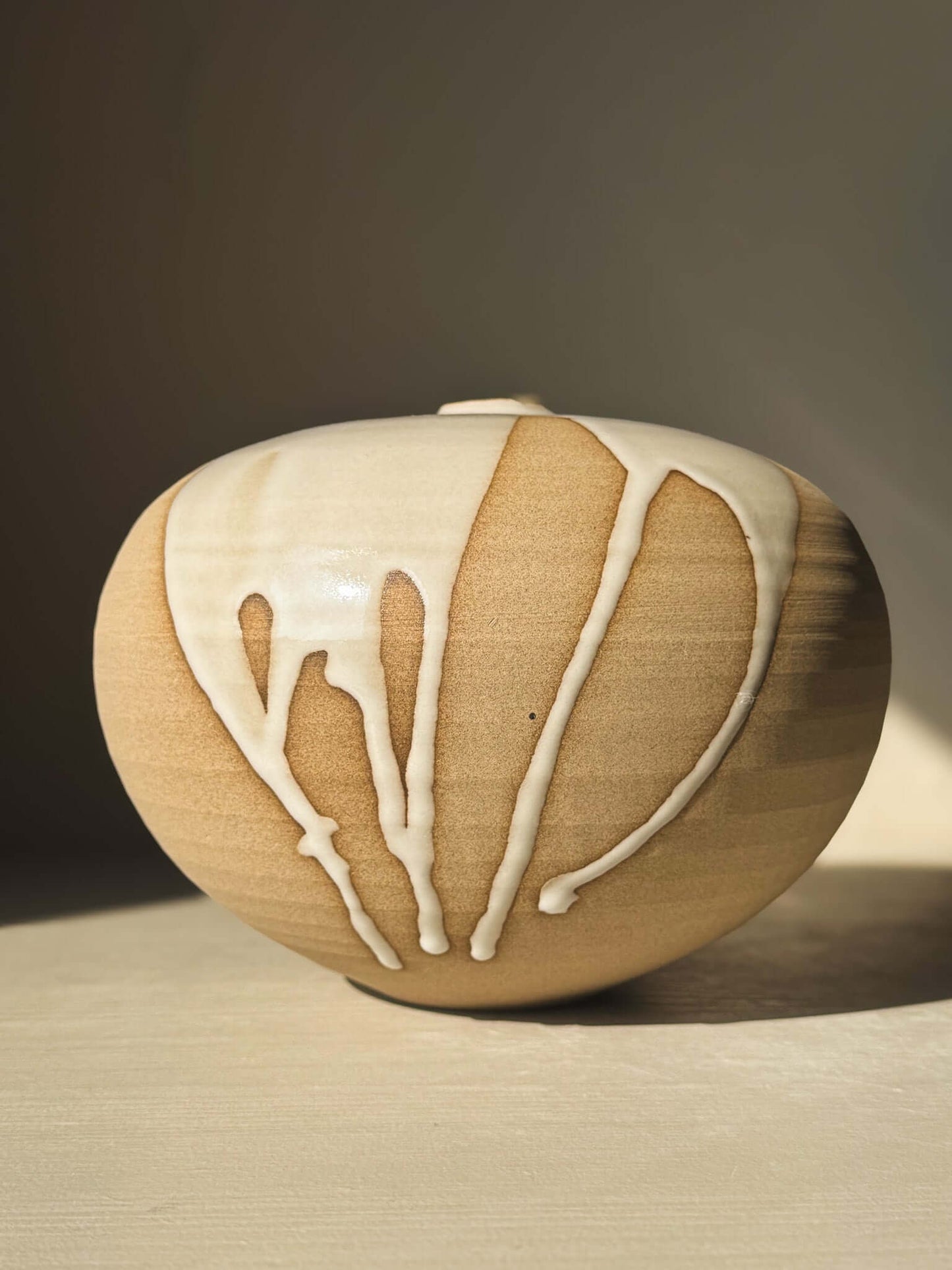 Orb Vase – #19 with unique glaze patterns showcasing handcrafted artistry and organic spherical design, perfect for modern décor.