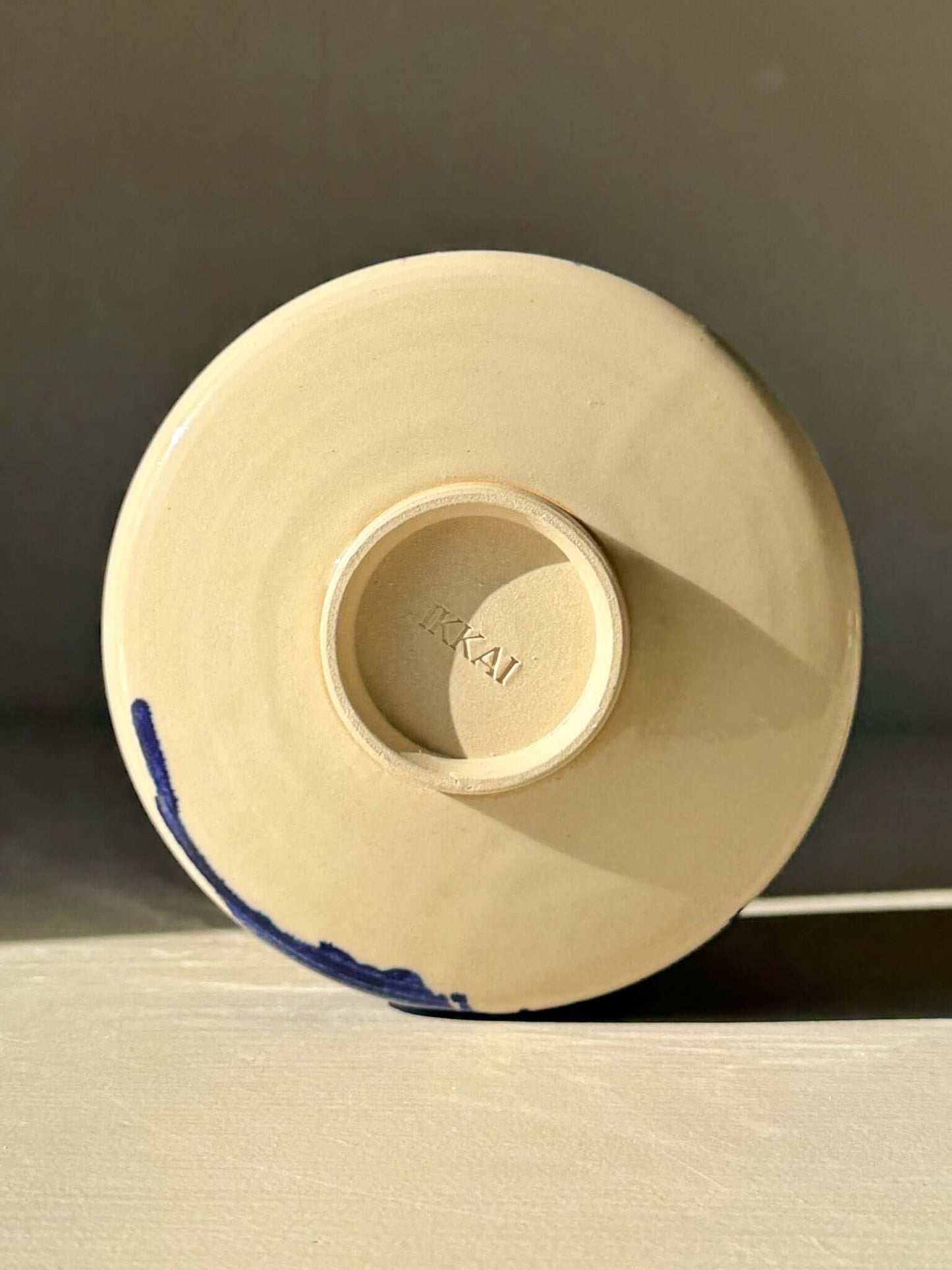 Bottom view of Matcha Bowl – Gosu Series #03 featuring cobalt glaze on ceramic.