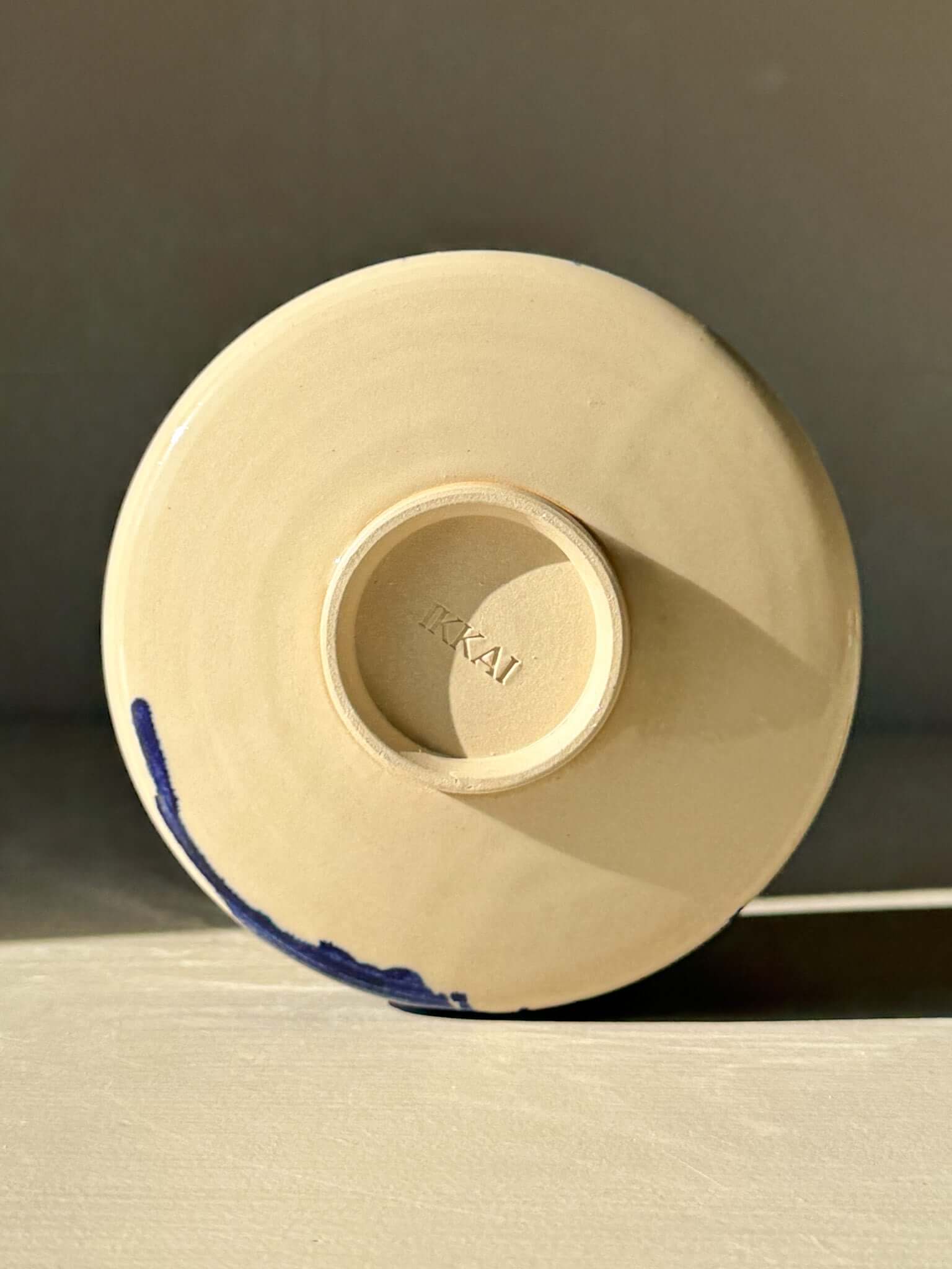 Bottom view of Matcha Bowl – Gosu Series #03 featuring cobalt glaze on ceramic.