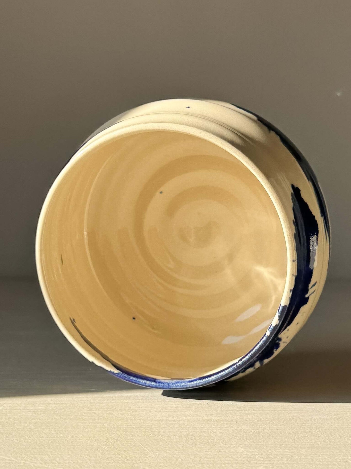 Matcha Bowl – Gosu Series #04 with cobalt glaze and scenic design on rounded surface.