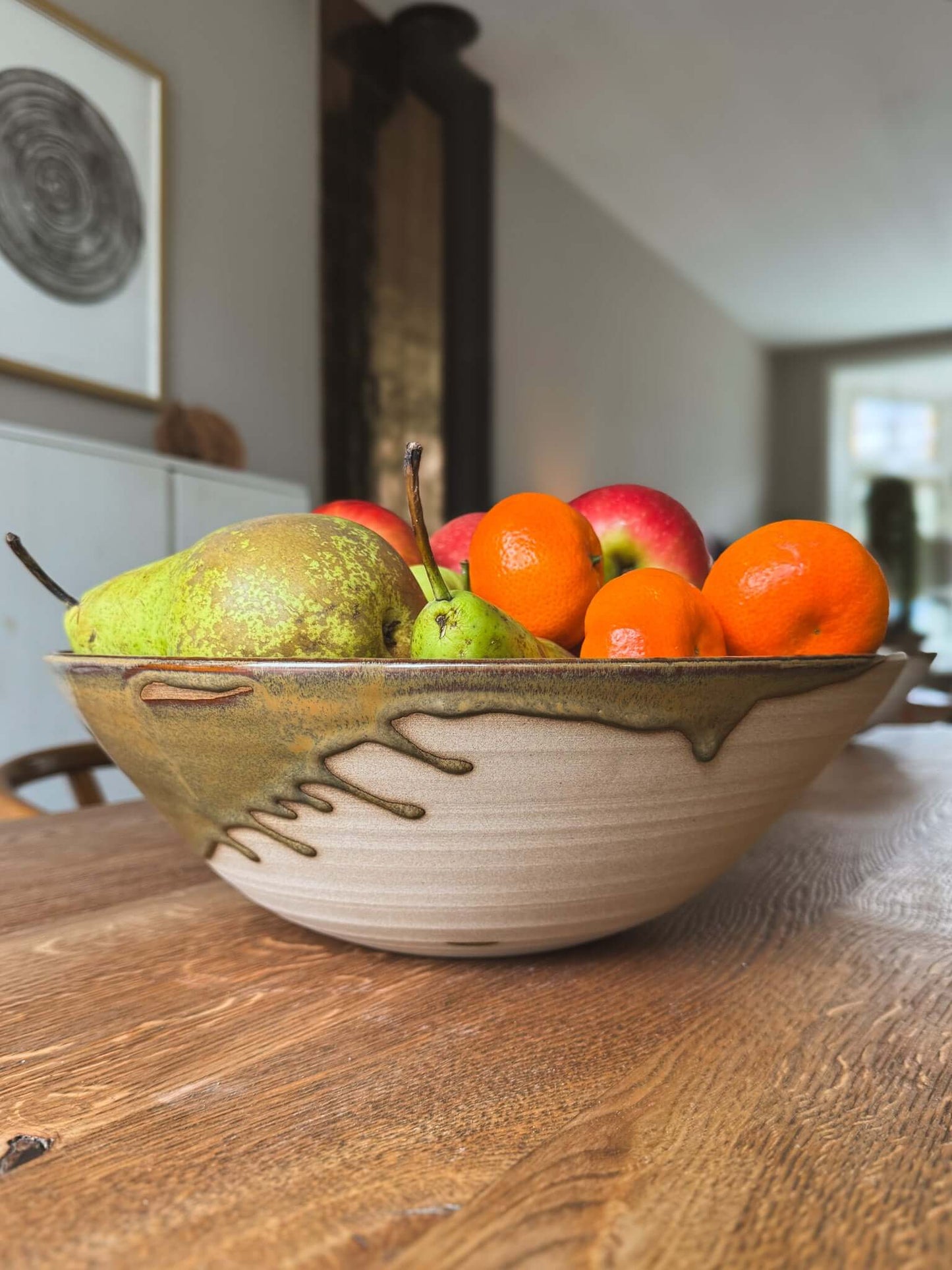 Large Bowl - Inyo #03 showcasing fresh fruits including pears and oranges on a wooden table.