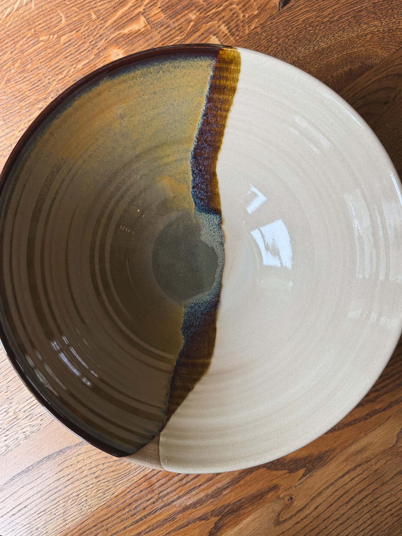 Large Bowl - Inyo #03 featuring glossy tenmoku glaze and soft clear finishes, showcasing unique flowing contrasts.