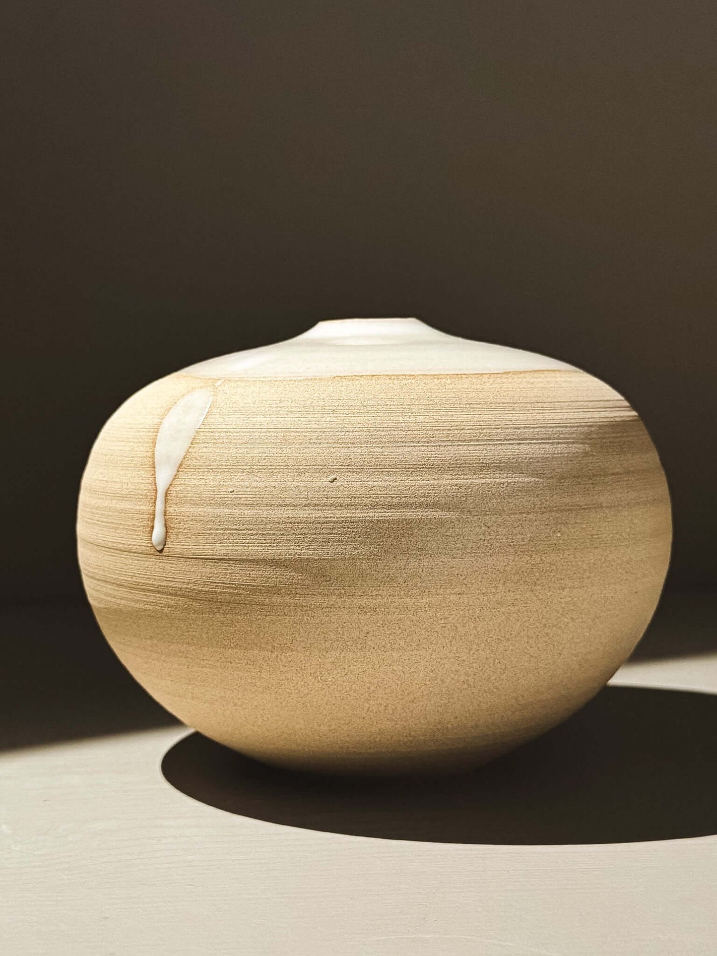 Orb Vase – Yuki #03 showcasing soft curves and unique glaze details under natural light.